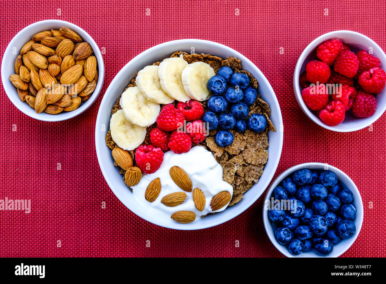 Health Breakfast Bowl of Cereals Fresh Fruit and Nuts With Yogurt in