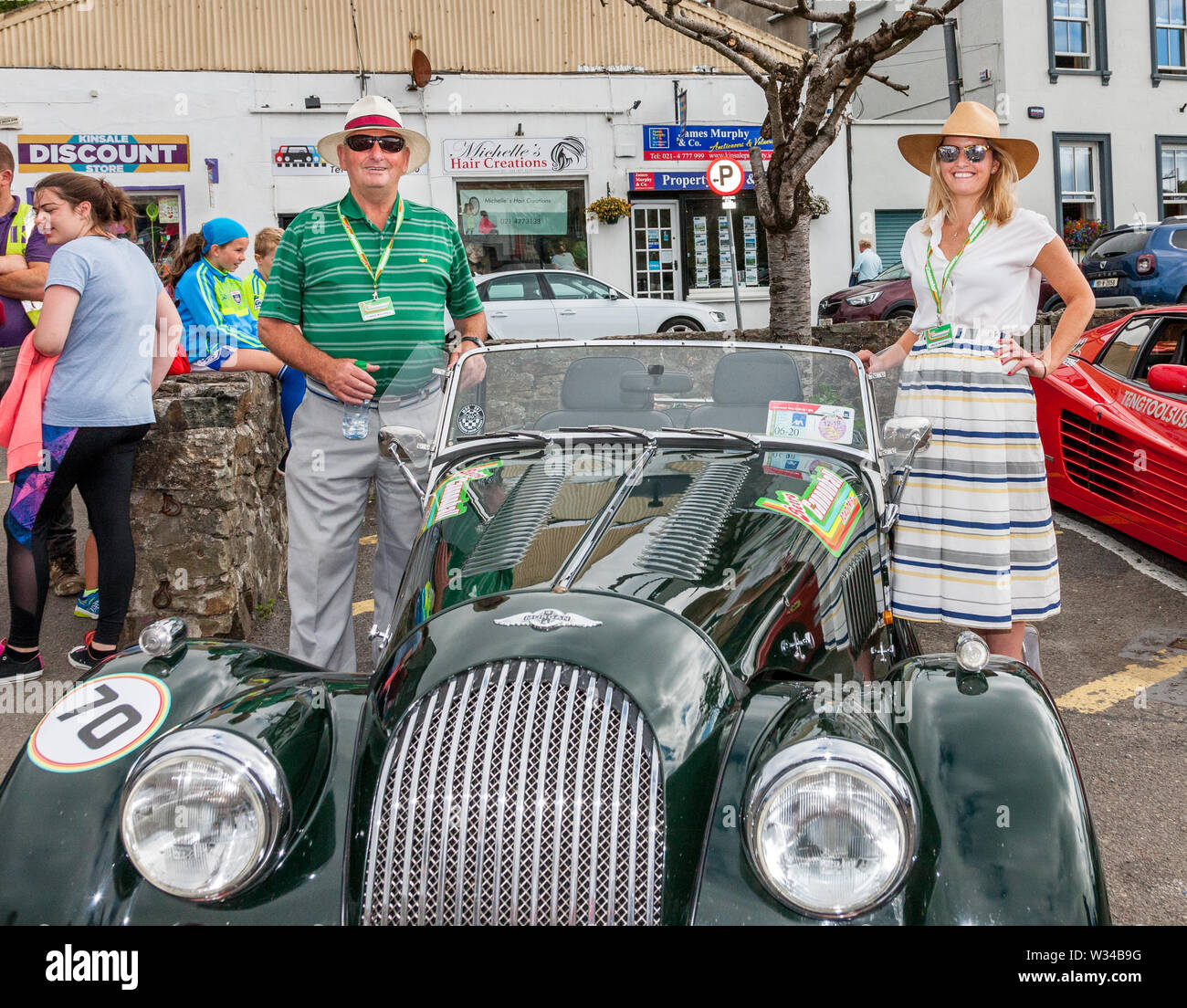 Kinsale, Cork, Ireland. 12th July, 2019. Con and Grace Mulvihill with their 1988 Morgan 44 at the starting line of the Cannononball Retro Road Trip in Kinsale, Co. Cork, Ireland. The classic run starts in Kinsale and takes in Healy Pass, Kenmare, Molls Gap, Inch Beach, Dingle, Slea Head, Conor Pass, Tralee and finishes at Bunratty Castle on July 13th 2019. Credit: David Creedon/Alamy Live News Stock Photo