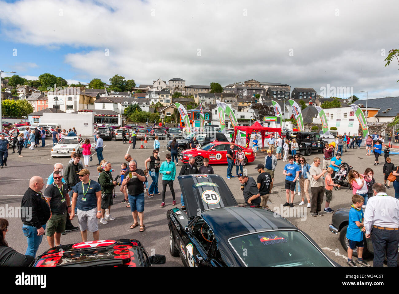 Kinsale, Cork, Ireland. 12th July, 2019. A section of the crowd at the starting line of the Cannononball Retro Road Trip in Kinsale, Co. Cork, Ireland. The classic run starts in Kinsale and takes in Healy Pass, Kenmare, Molls Gap, Inch Beach, Dingle, Slea Head, Conor Pass, Tralee and finishes at Bunratty Castle on July 13th 2019. Credit: David Creedon/Alamy Live News Stock Photo