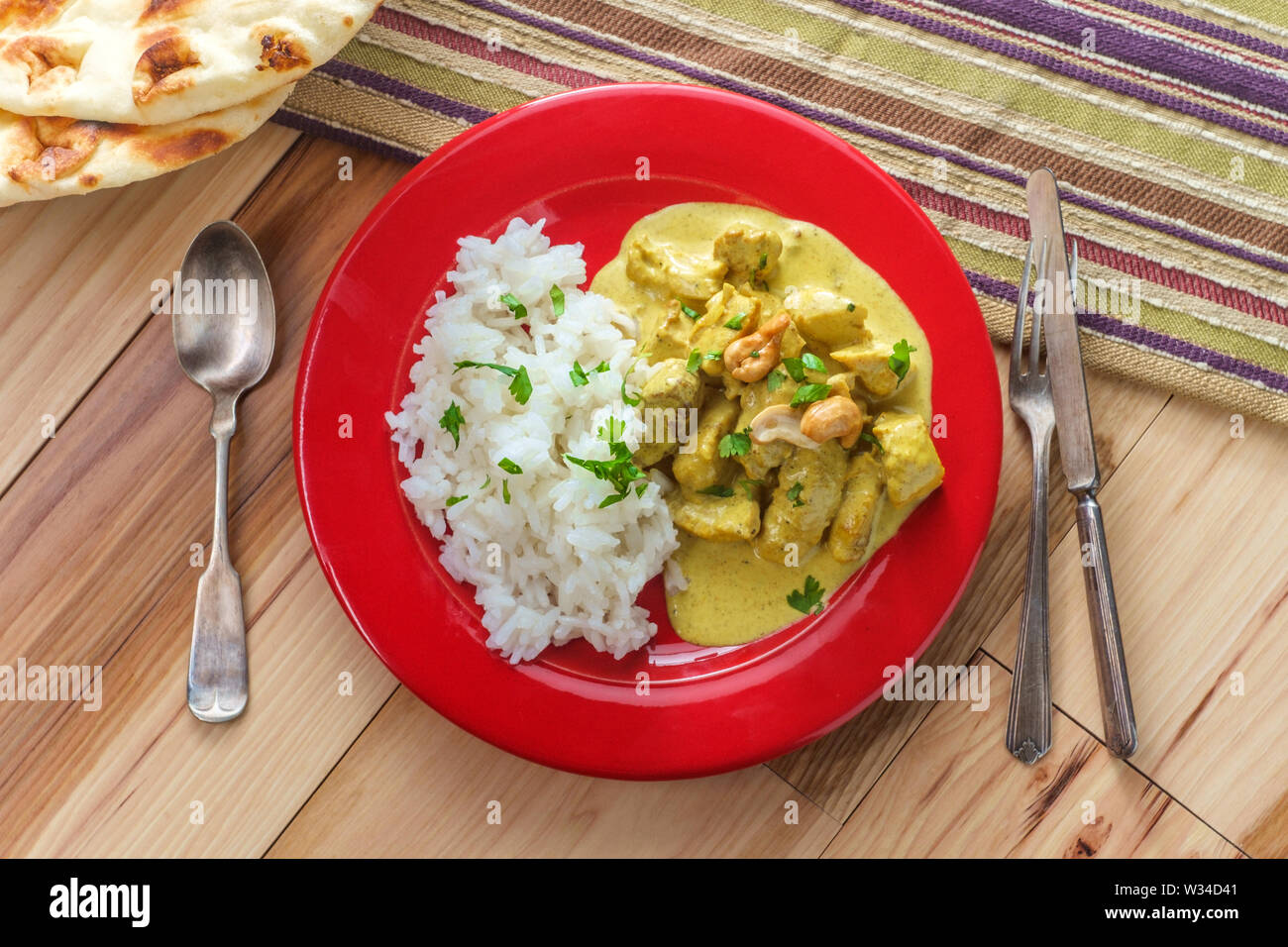 Authentic Indian chicken korma curry with jasmine rice Stock Photo - Alamy