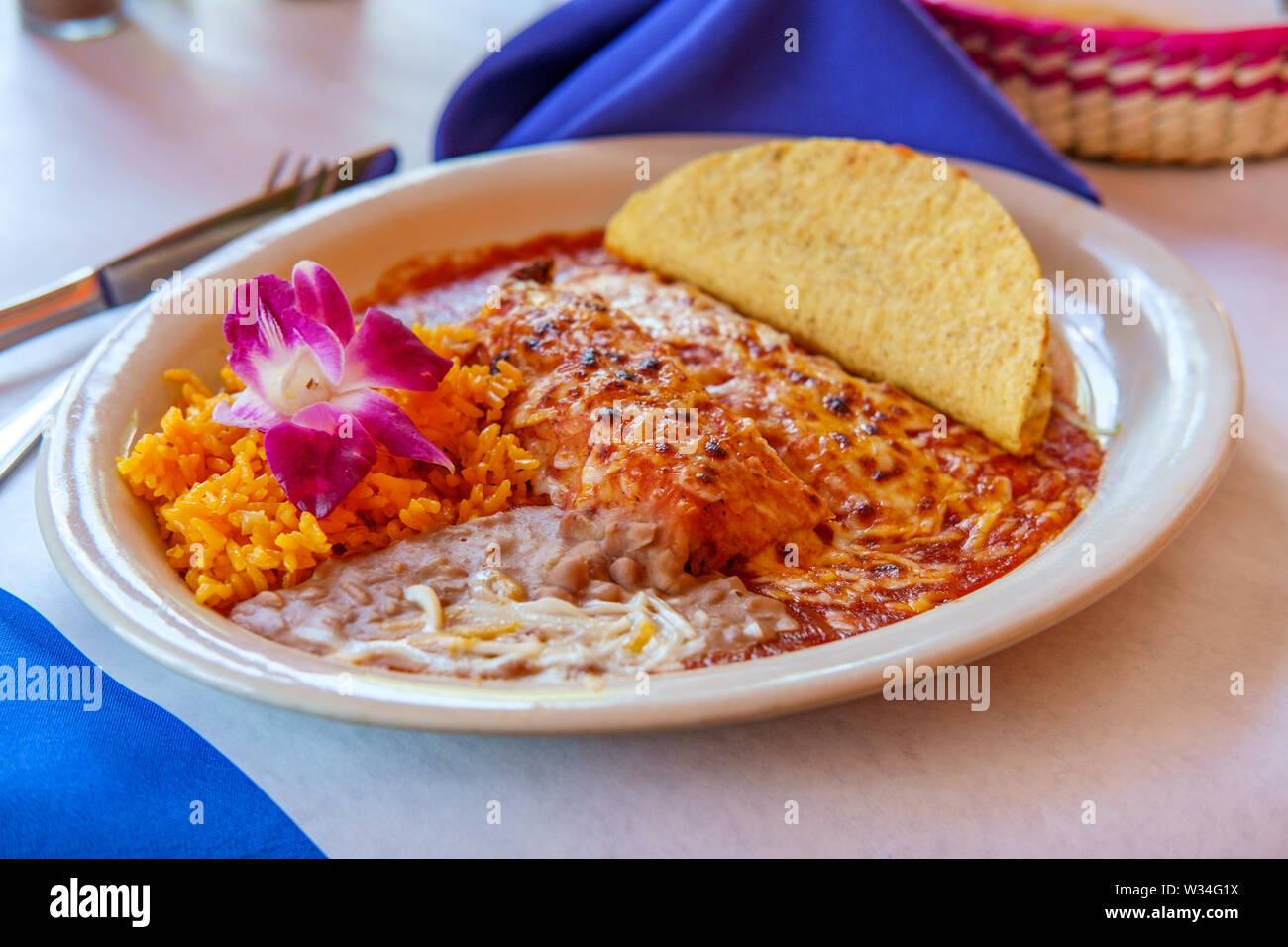 Authentic Mexican tamale cheese enchilada and beef taco dinner with