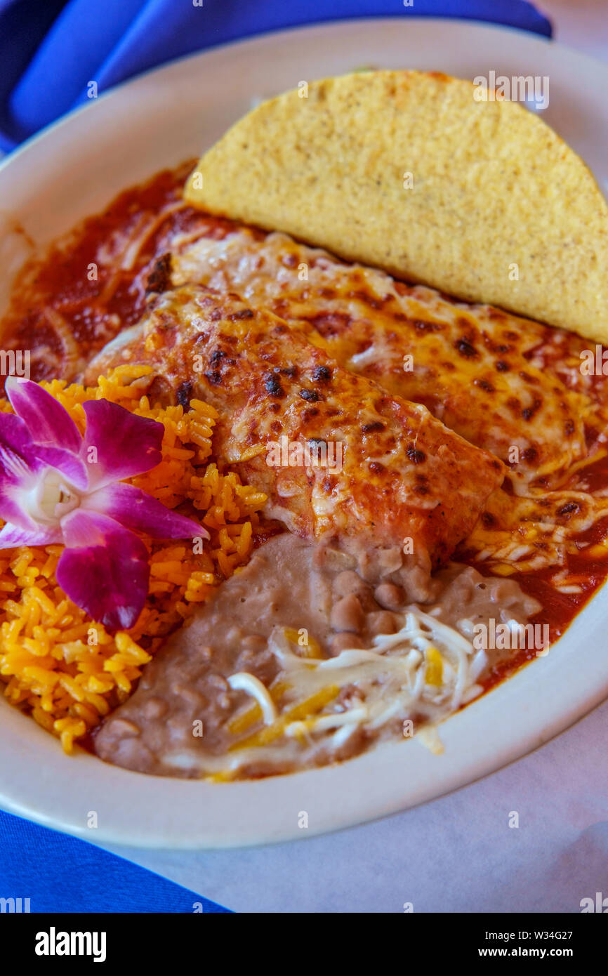 Authentic Mexican tamale cheese enchilada and beef taco dinner with