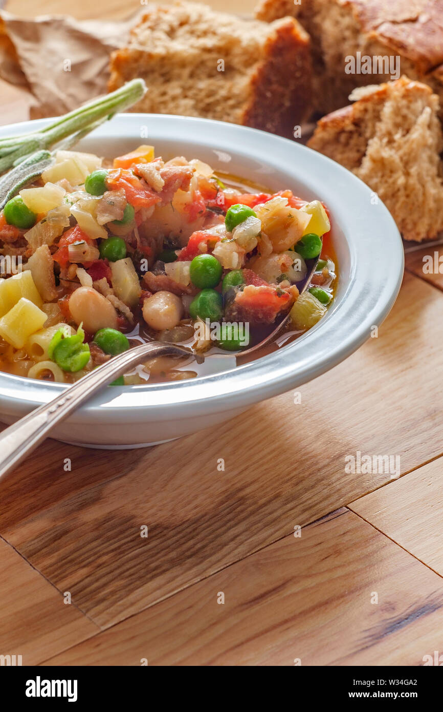 Hearty Italian minestrone soup with sausage and ditalini pasta Stock