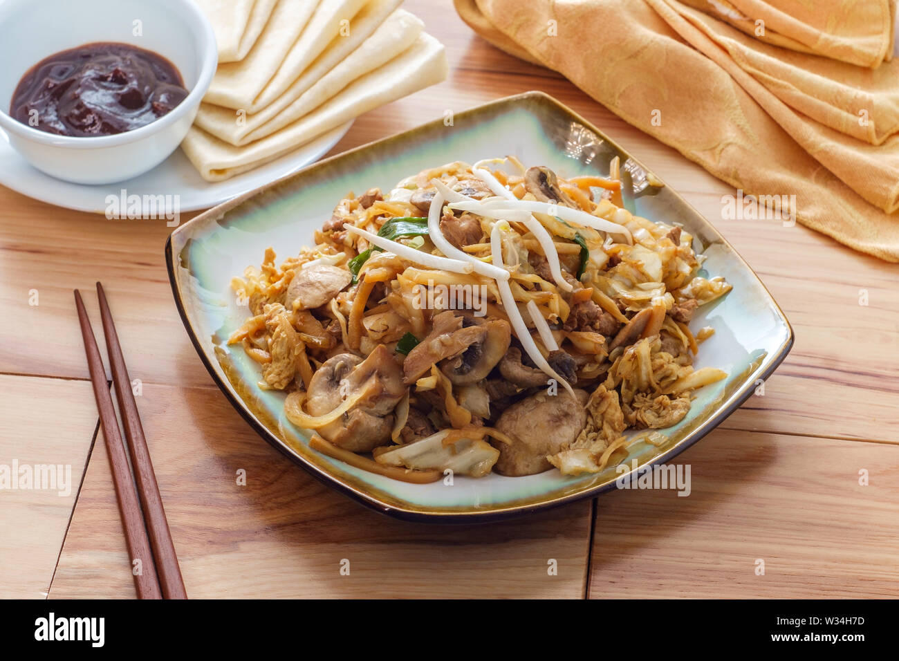 Chinese food Moo shu pork with Mandarin pancake wrappers and hoisin