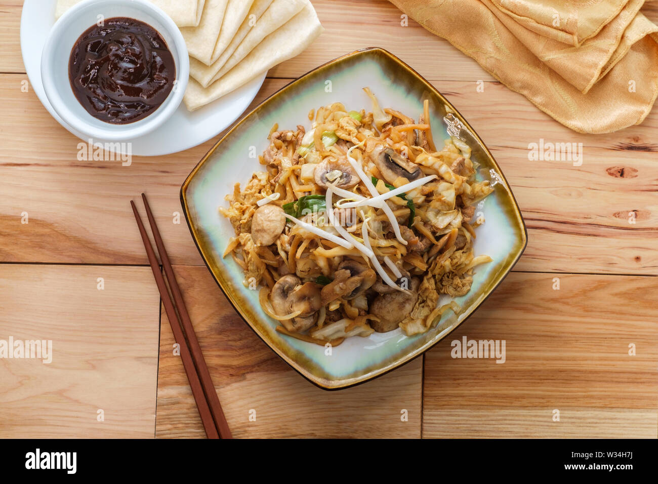 Chinese food Moo shu pork with Mandarin pancake wrappers and hoisin