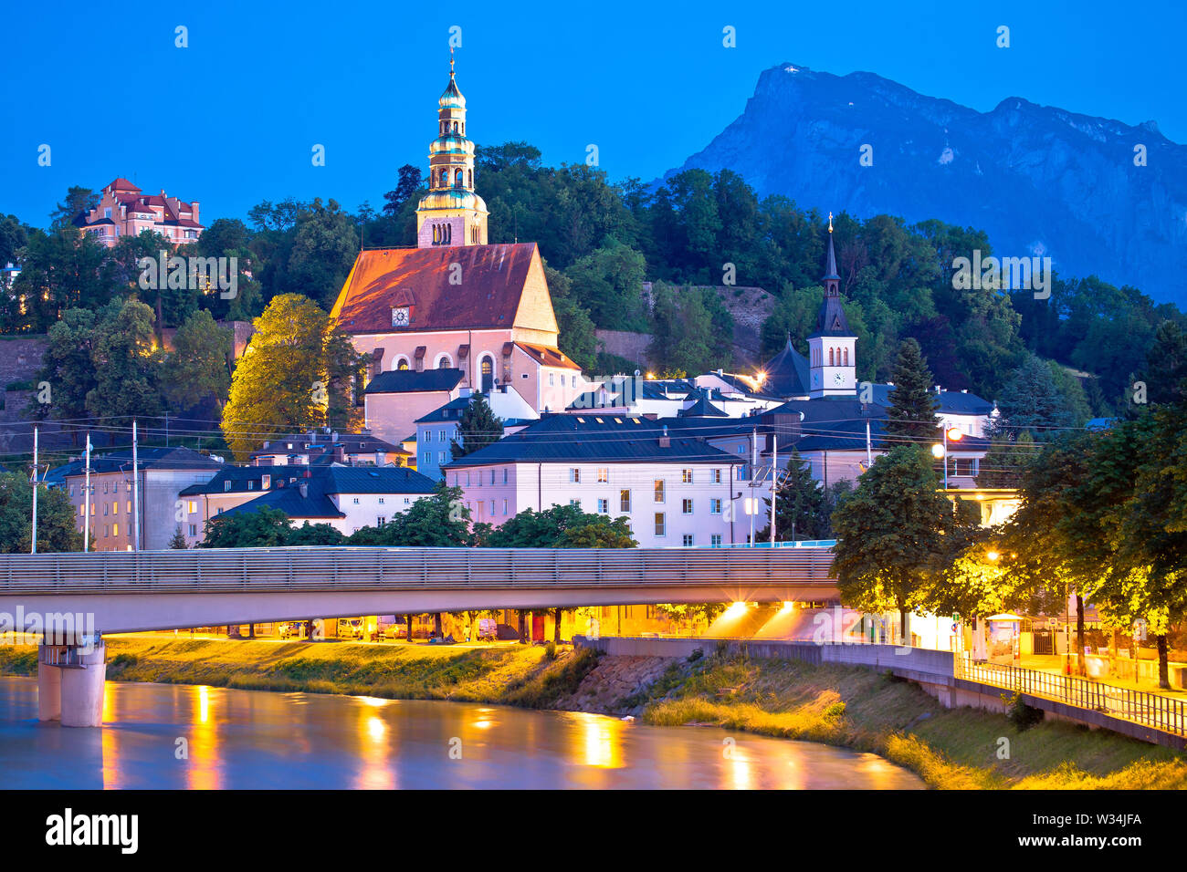 salzburg-historic-architecture-and-mountain-peaks-background-evening