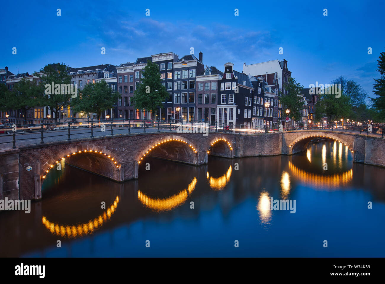 Photo of the canals of Amsterdam at the blue hour time Stock Photo