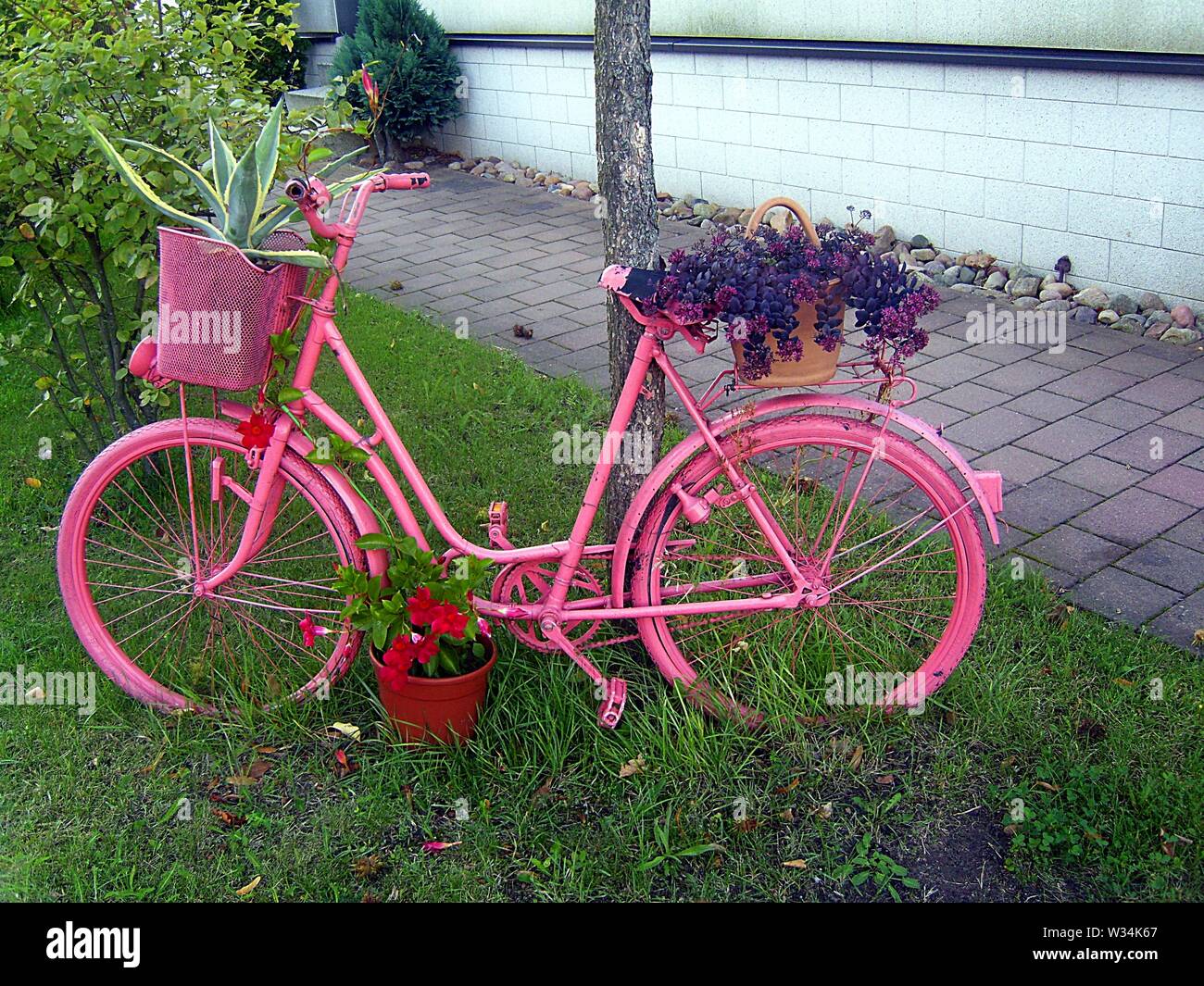 decorated bicycle on the roadside Stock Photo