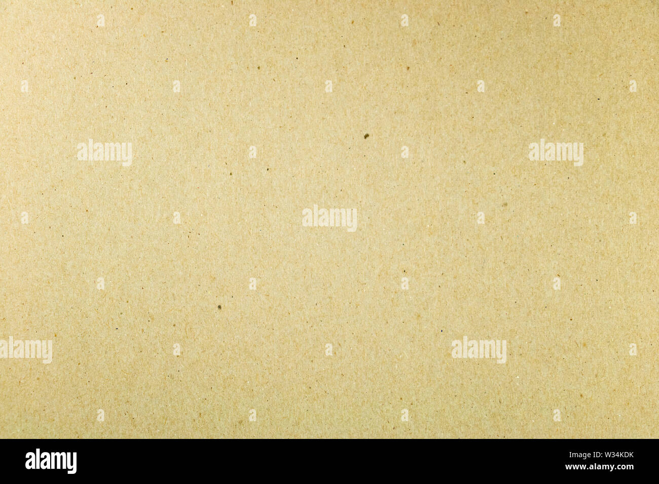 Graphic resource cardboard texture background in ocher tones Stock Photo