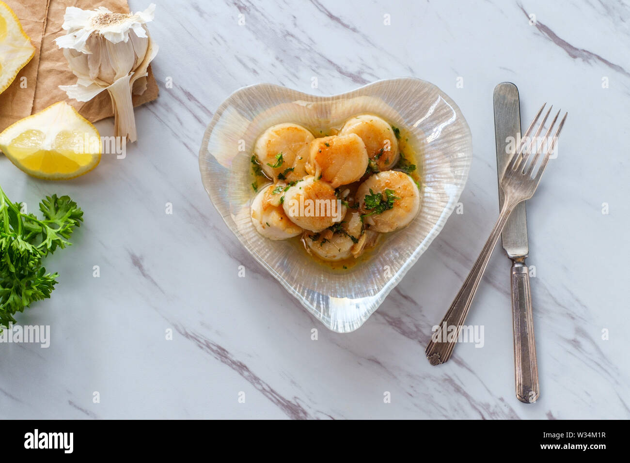 Seared scallops and herbs hires stock photography and images Alamy