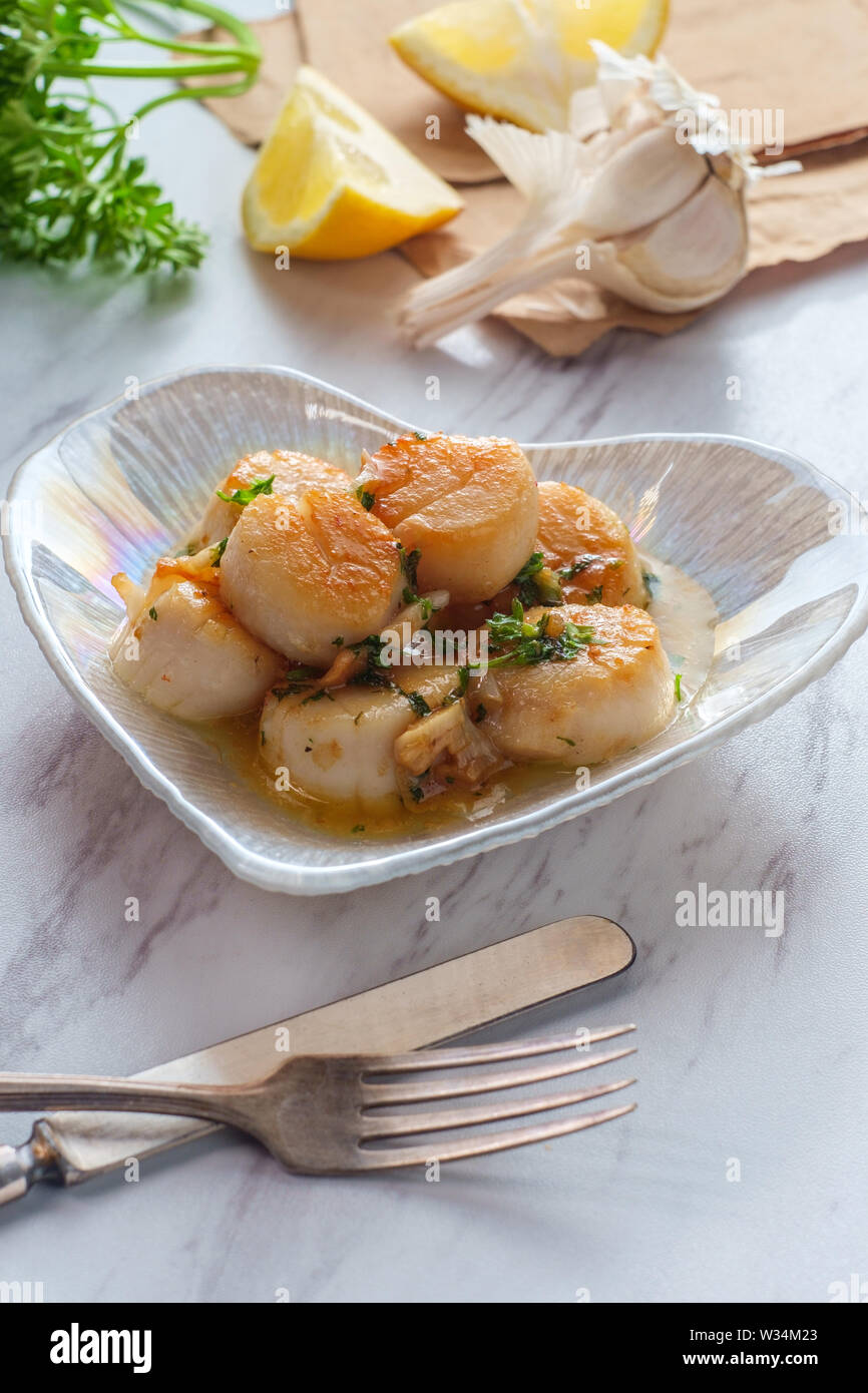 Seared scallops and herbs hires stock photography and images Alamy