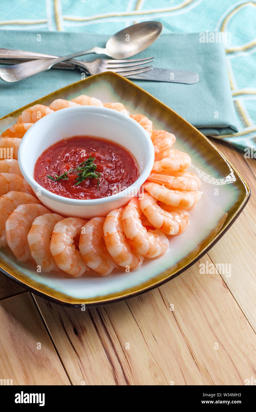 Delightful tailon shrimp cocktail served with horseradish dipping