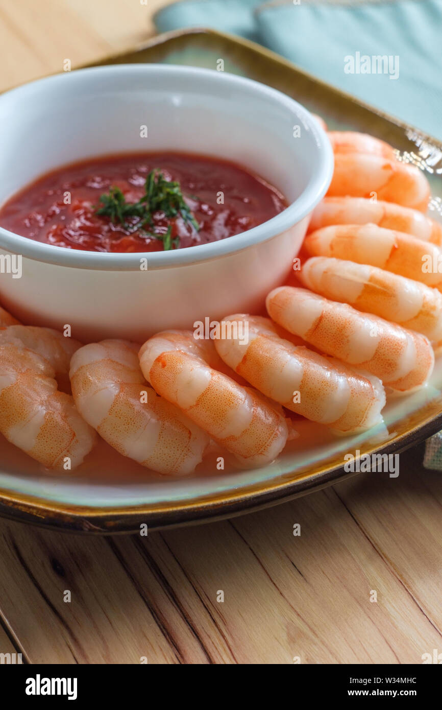 Delightful tailon shrimp cocktail served with horseradish dipping