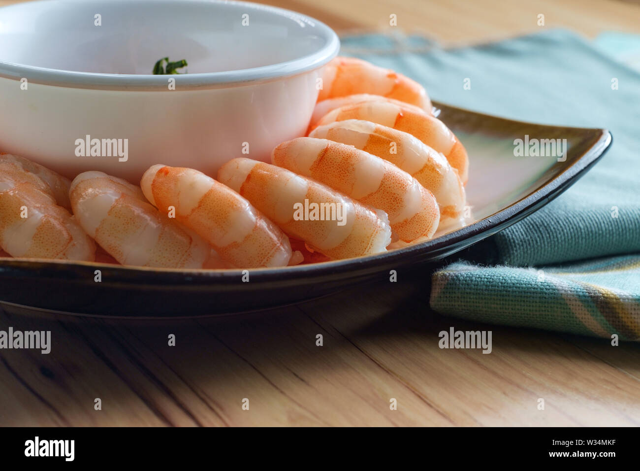 Delightful tailon shrimp cocktail served with horseradish dipping