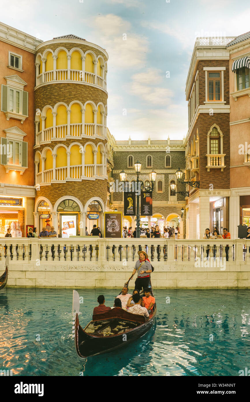 Gondola and canal in the shopping mall of the Venetian Macao. Stock Photo