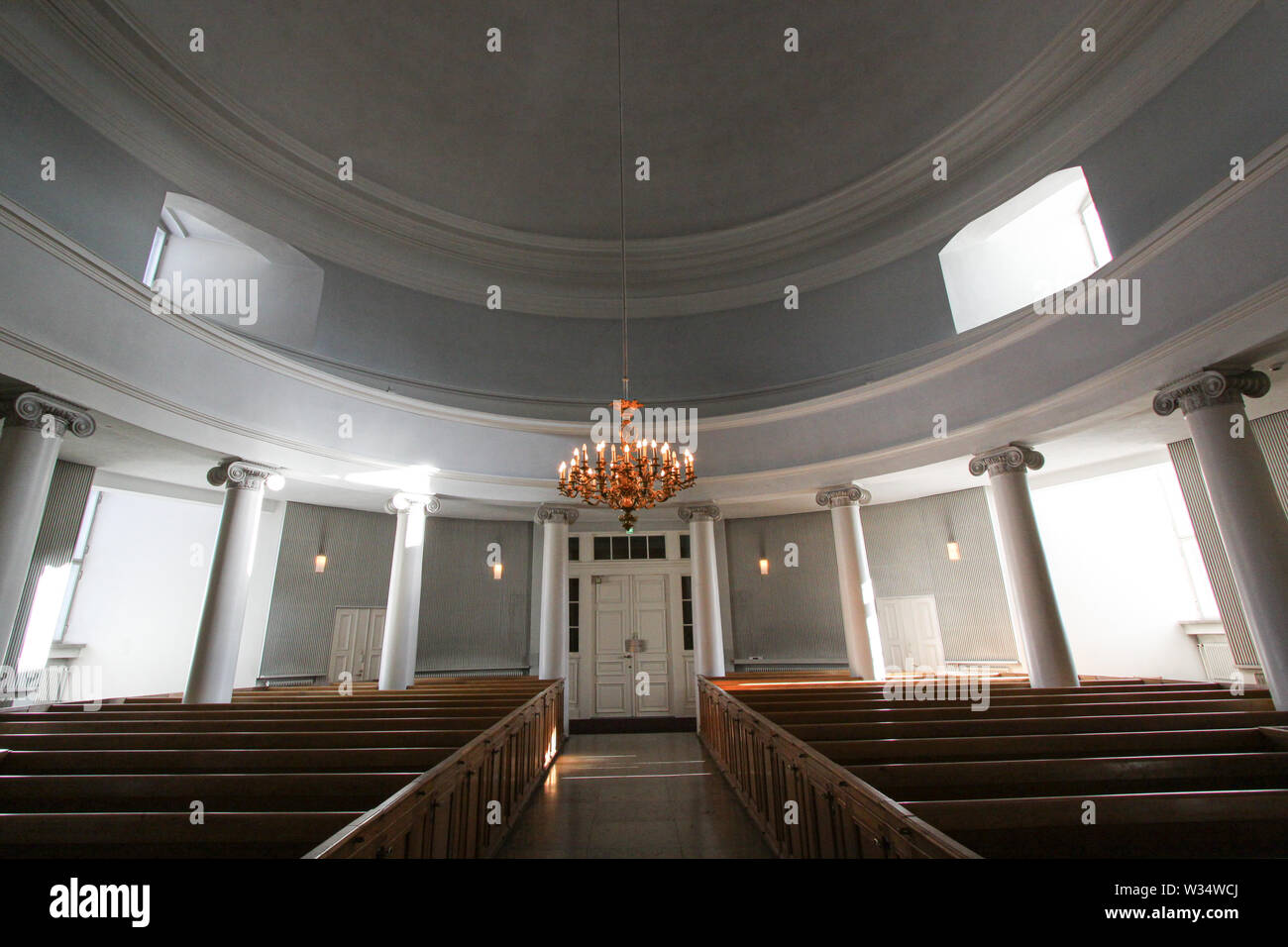 Helsinki Cathedral is a distinctive landmark, with its tall, green dome surrounded by four smaller domes.The Finnish Evangelical Lutheran cathedral of Stock Photo