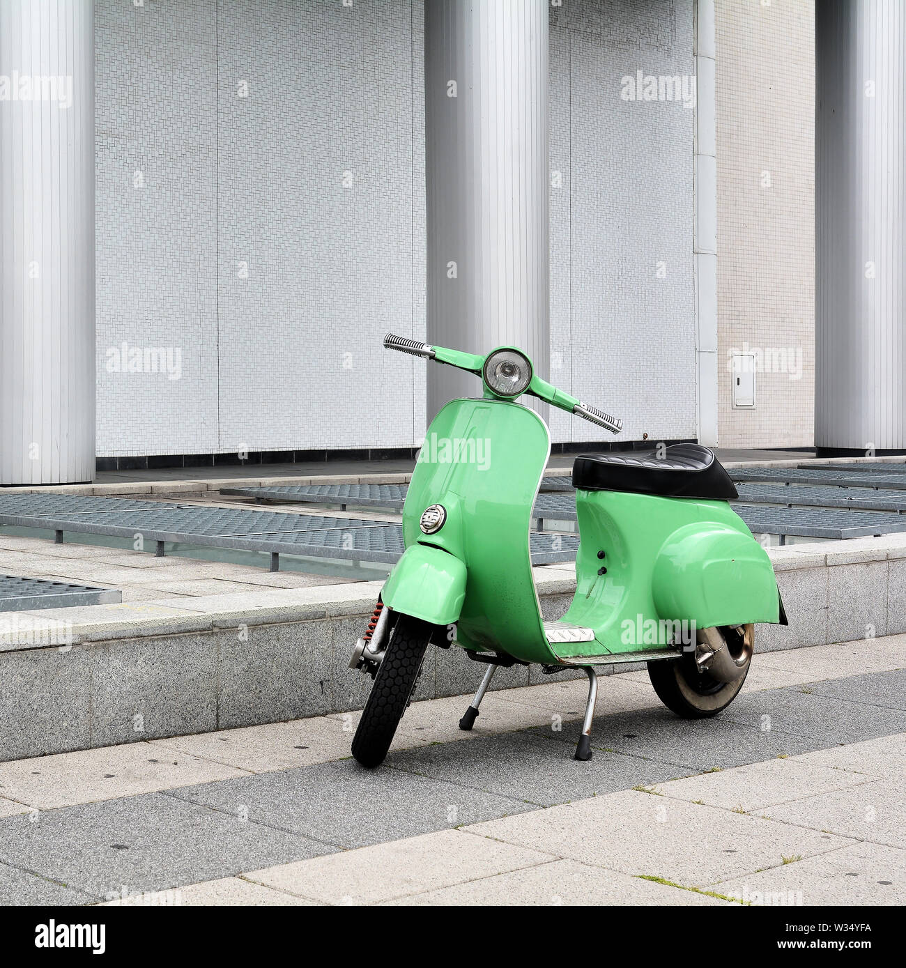 parked scooter in downtown Berlin Stock Photo