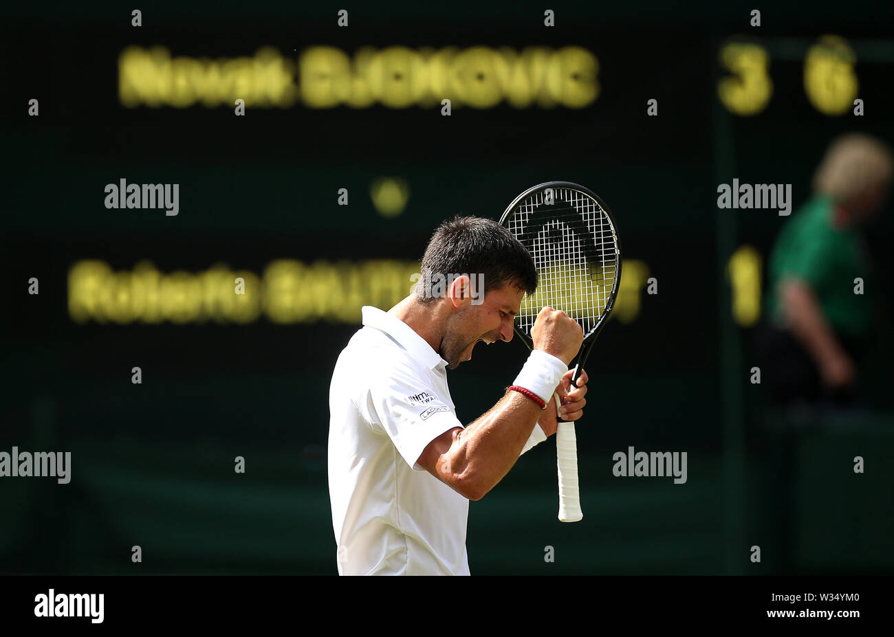 Novak Djokovic celebrates victory after winning his semifinal match