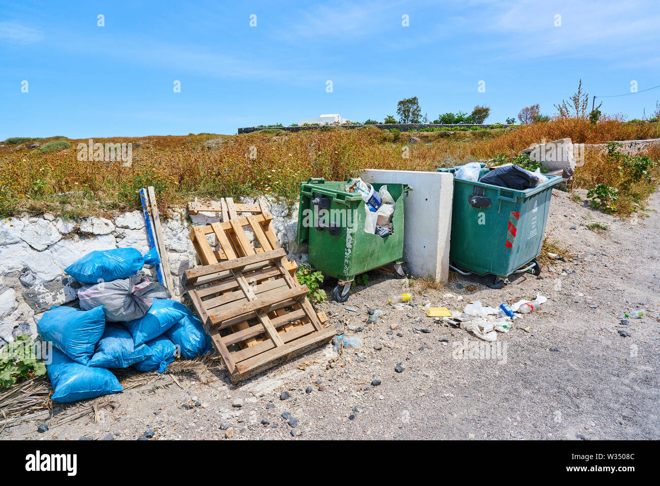 Plastic and wood waste and rubbish in Megalochori near Oia and Fira, Santorini , Greece at 31.05.2019. © Peter Schatz / Alamy Stock Photos Stock Photo