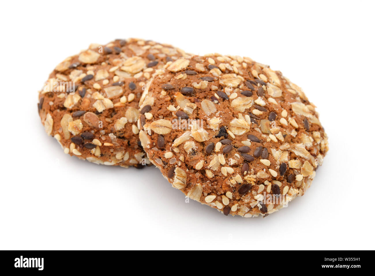 Pair of wholegrain organic biscuits isolated on white Stock Photo