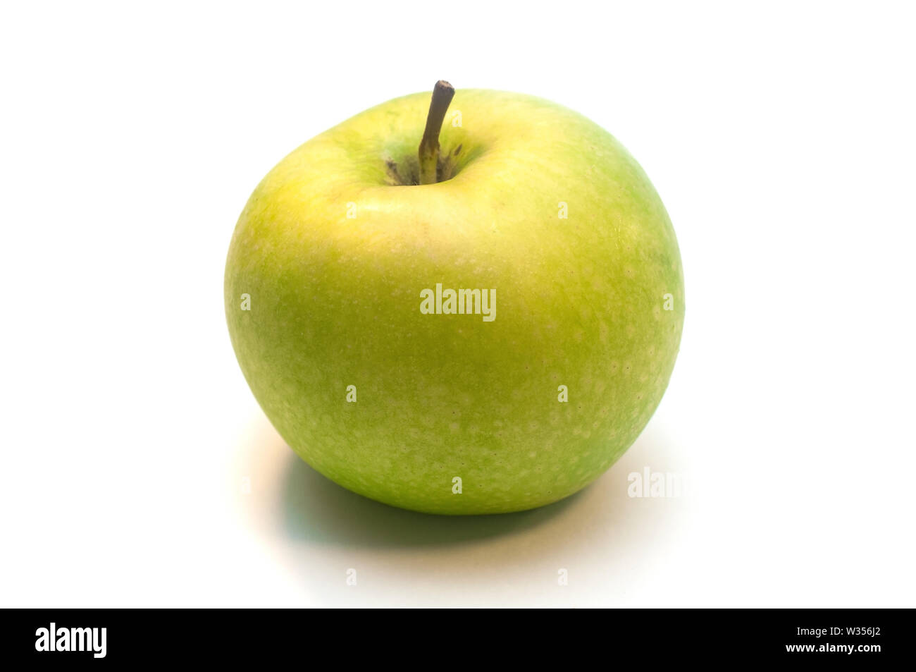 Green apple isolated on white background Stock Photo - Alamy