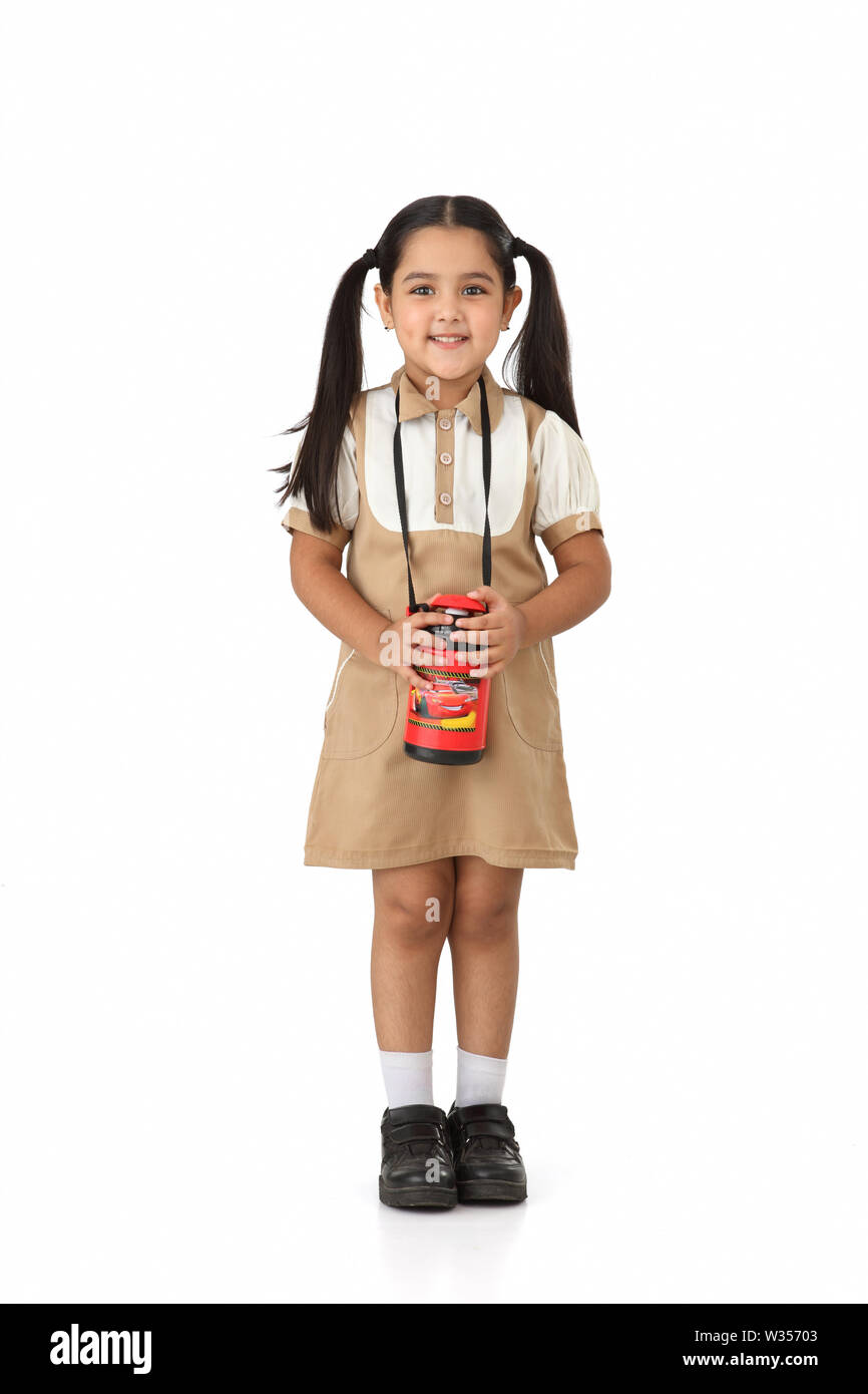 Portrait of a schoolgirl smiling Stock Photo - Alamy