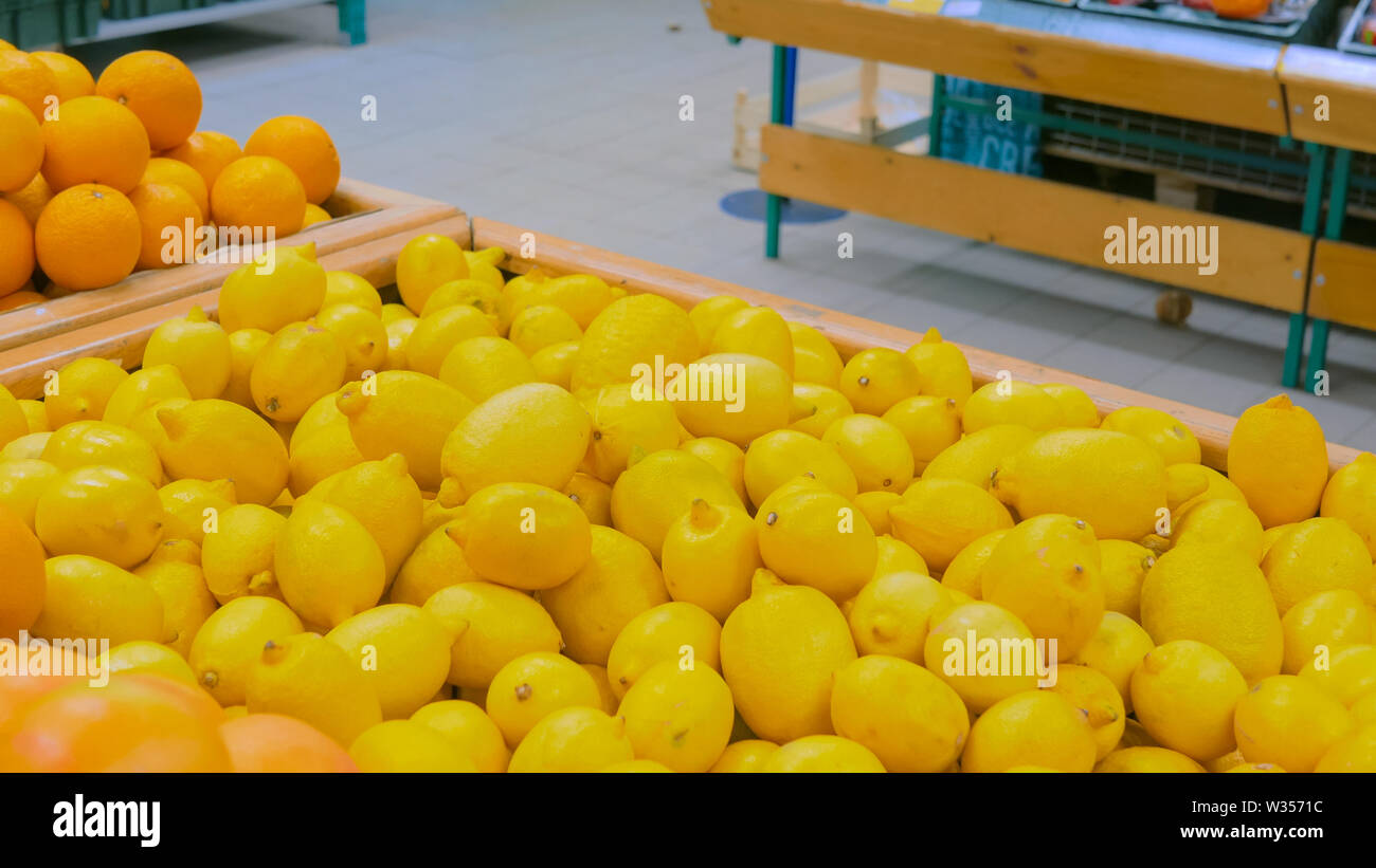 Yellow lemons at supermarket Stock Photo Alamy