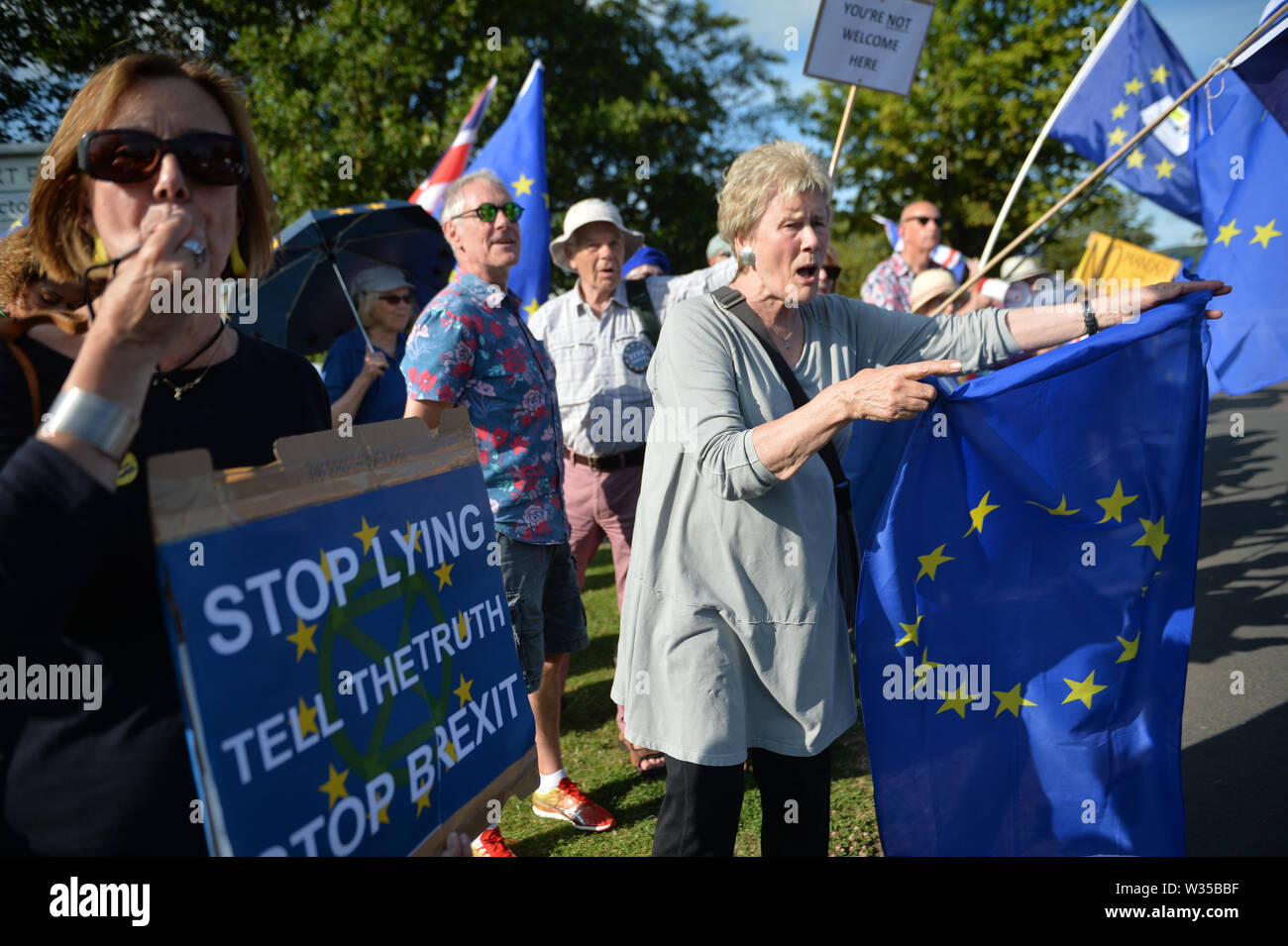 Anti-Brexit protesters demonstrate before a Tory leadership hustings in Cheltenham, Gloucestershire. Stock Photo