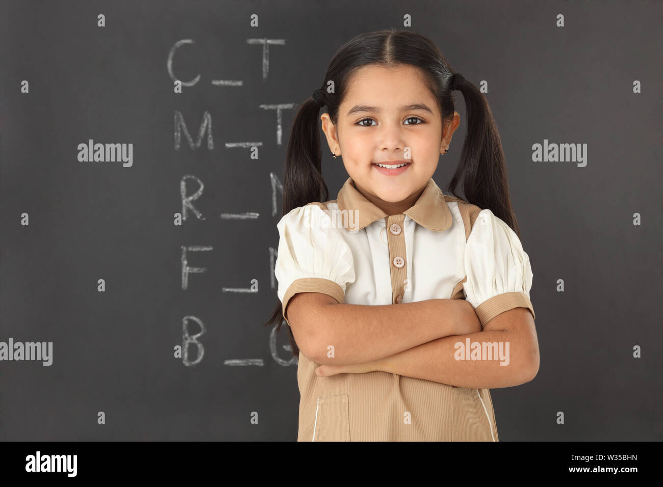 Portrait of an Indian schoolgirl smiling Stock Photo - Alamy