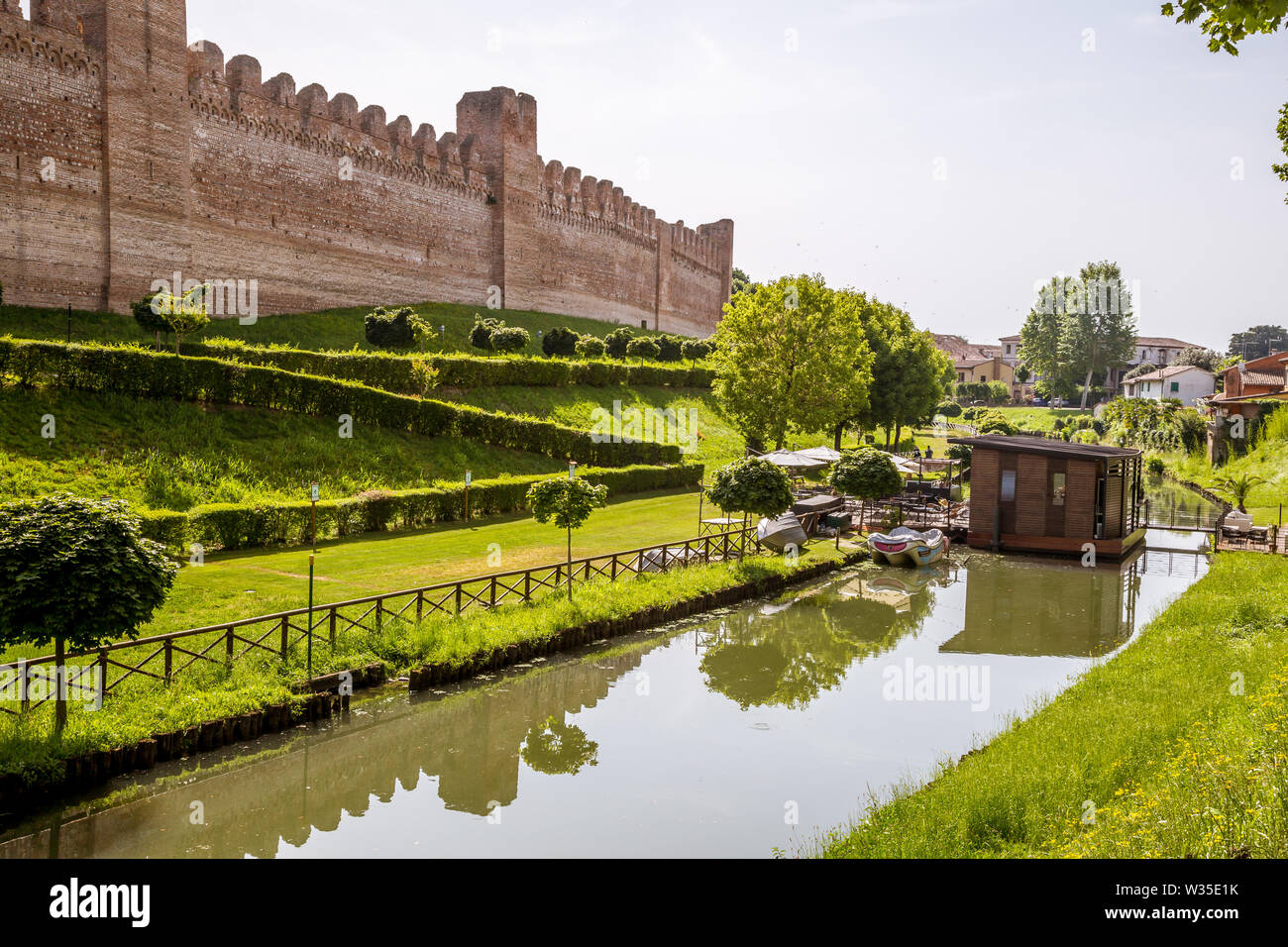View of the medieval walls and moat of the city of Cittadella