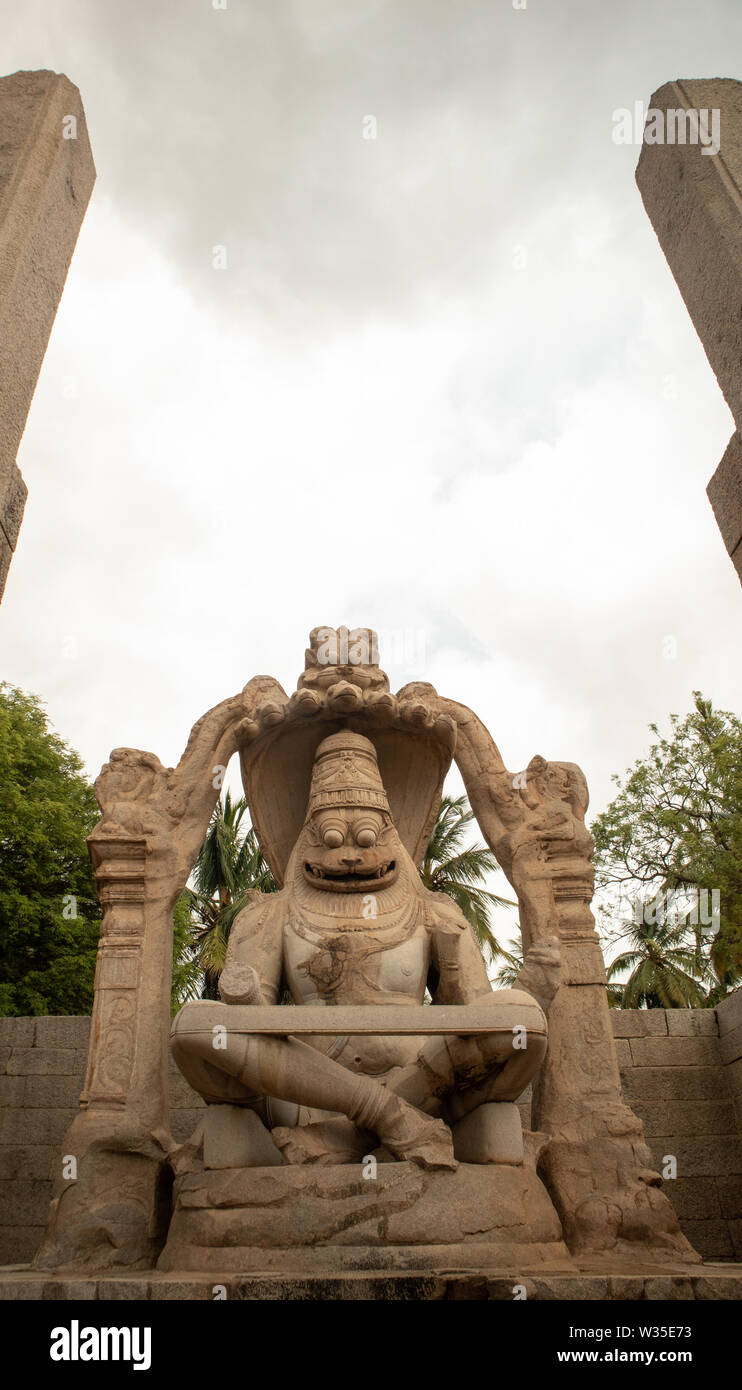 Ugra Narsimha or Lakshmi Narsimha temple at Hampi. The man-lion avatar of Lord Vishnu - seated in a yoga position Stock Photo