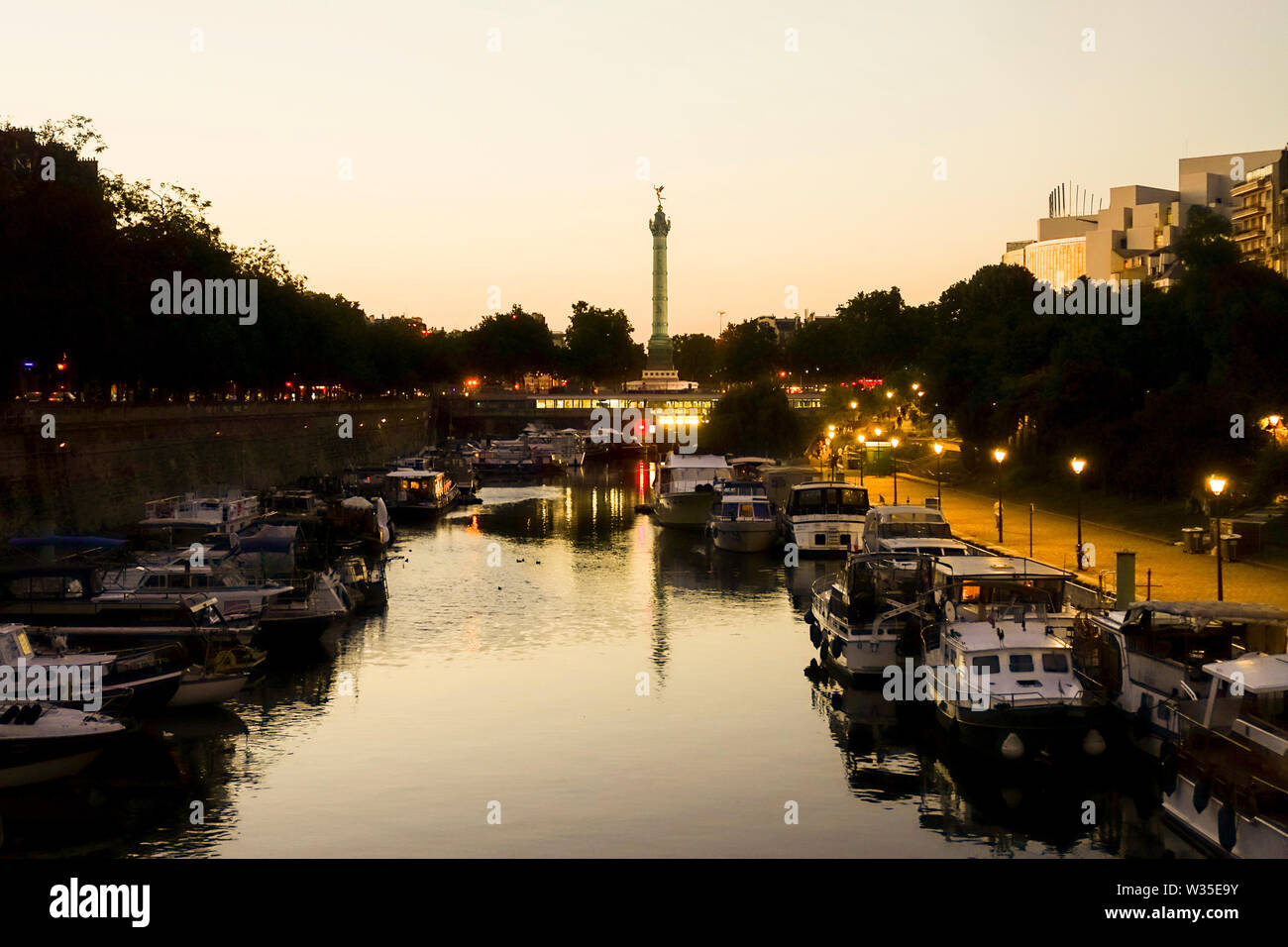 Boats and metro station Bastiller, Jardin du port de l'Arsenal, public park at Canal St Martin, Paris France. Stock Photo