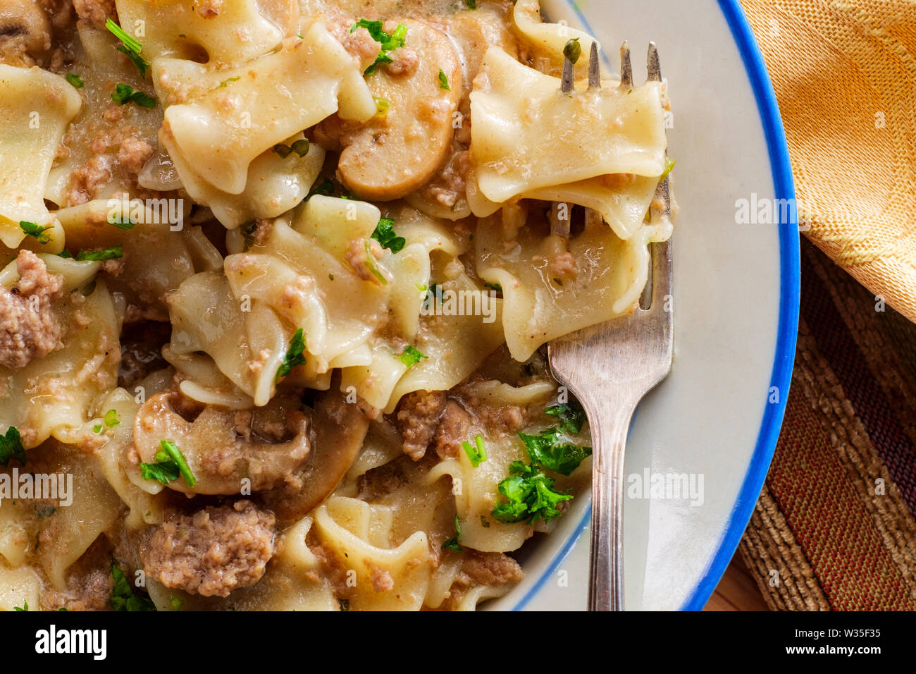 Creamy beef and mushroom stroganoff with egg noodles Stock Photo - Alamy