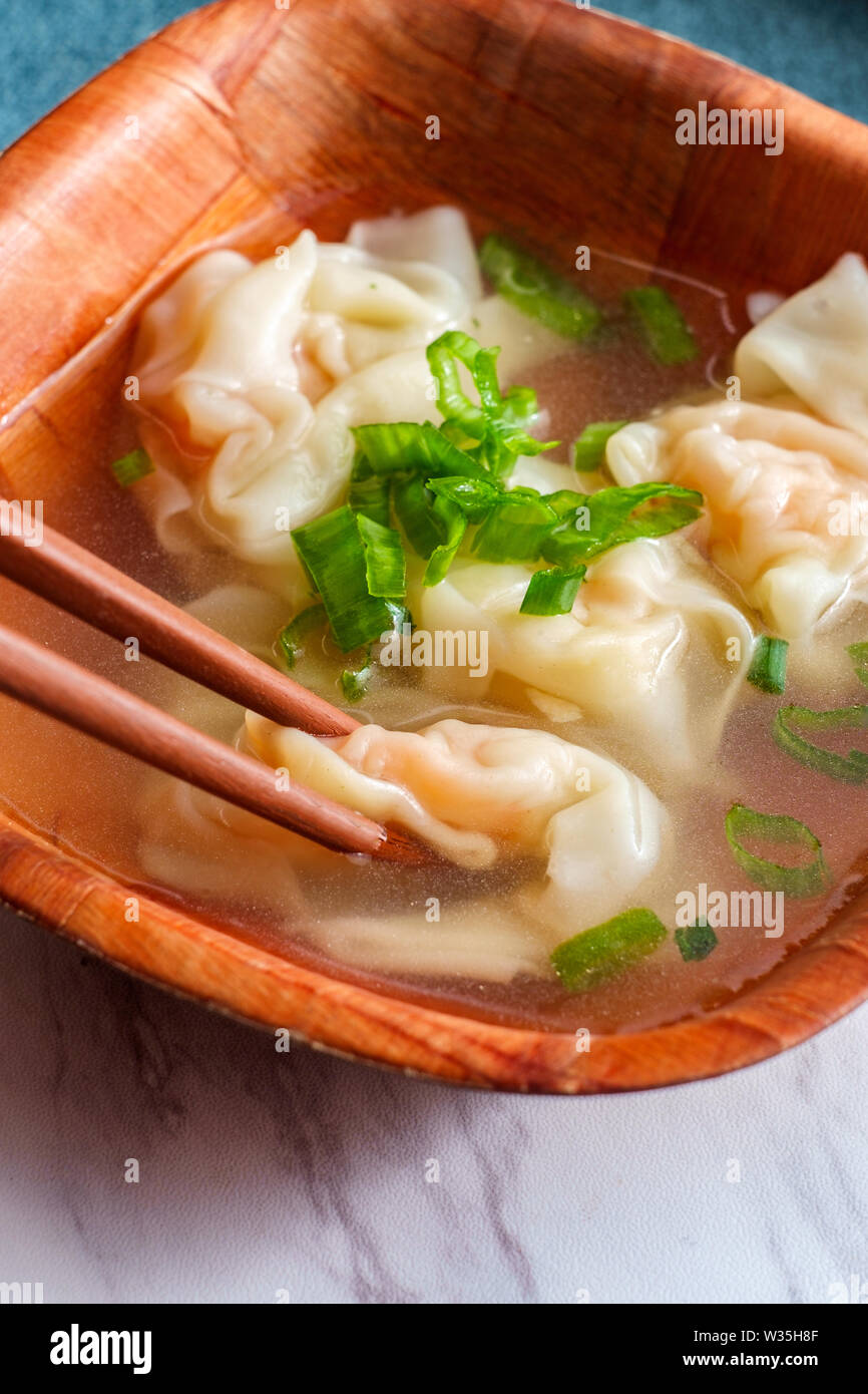 Authentic Chinese Food Shrimp Wonton Soup With Chopsticks And Duck Spoon Garnished With Sliced Green Onion Stock Photo Alamy