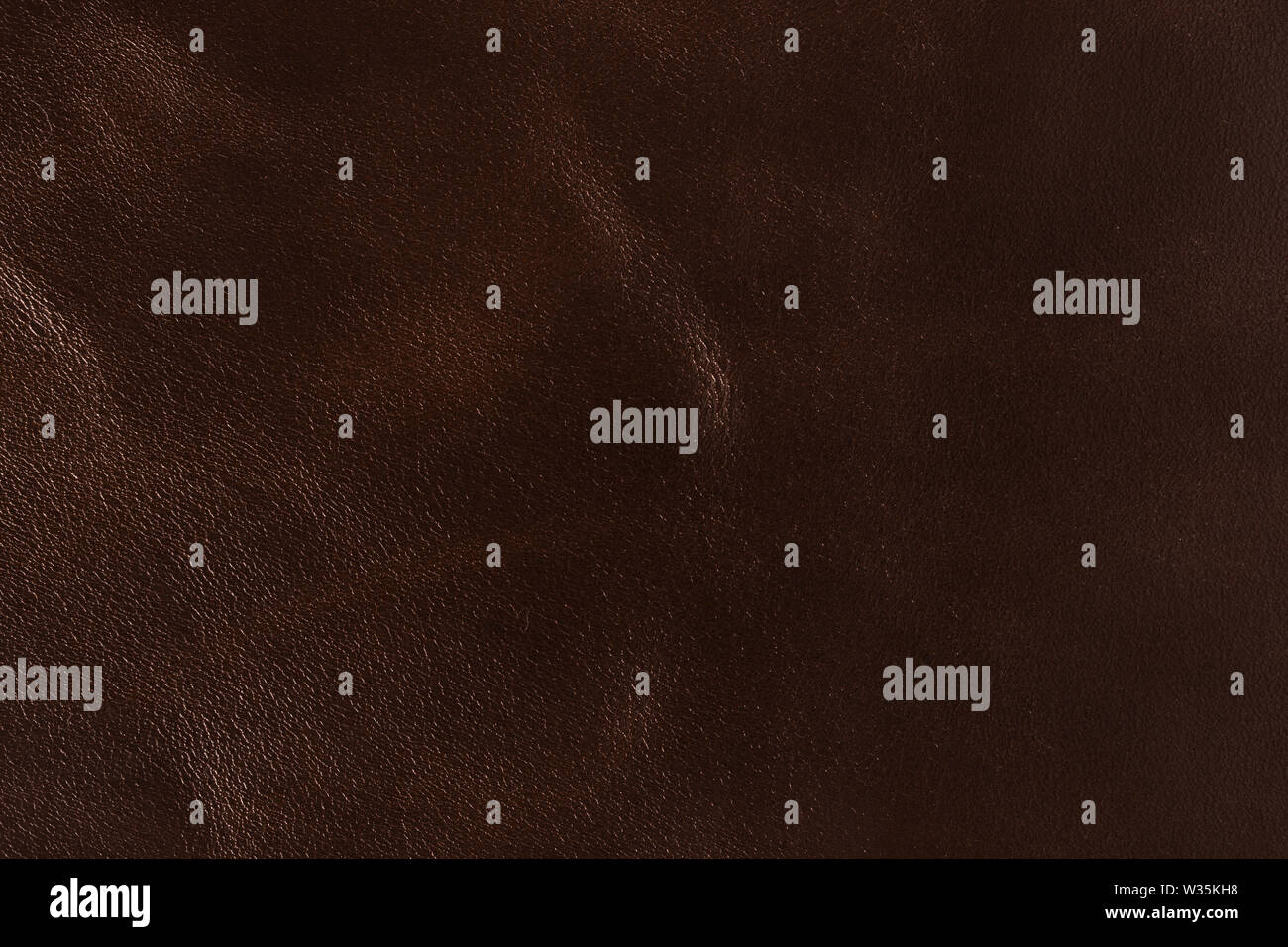 Dark brown leather texture. Useful as background. Stock Photo