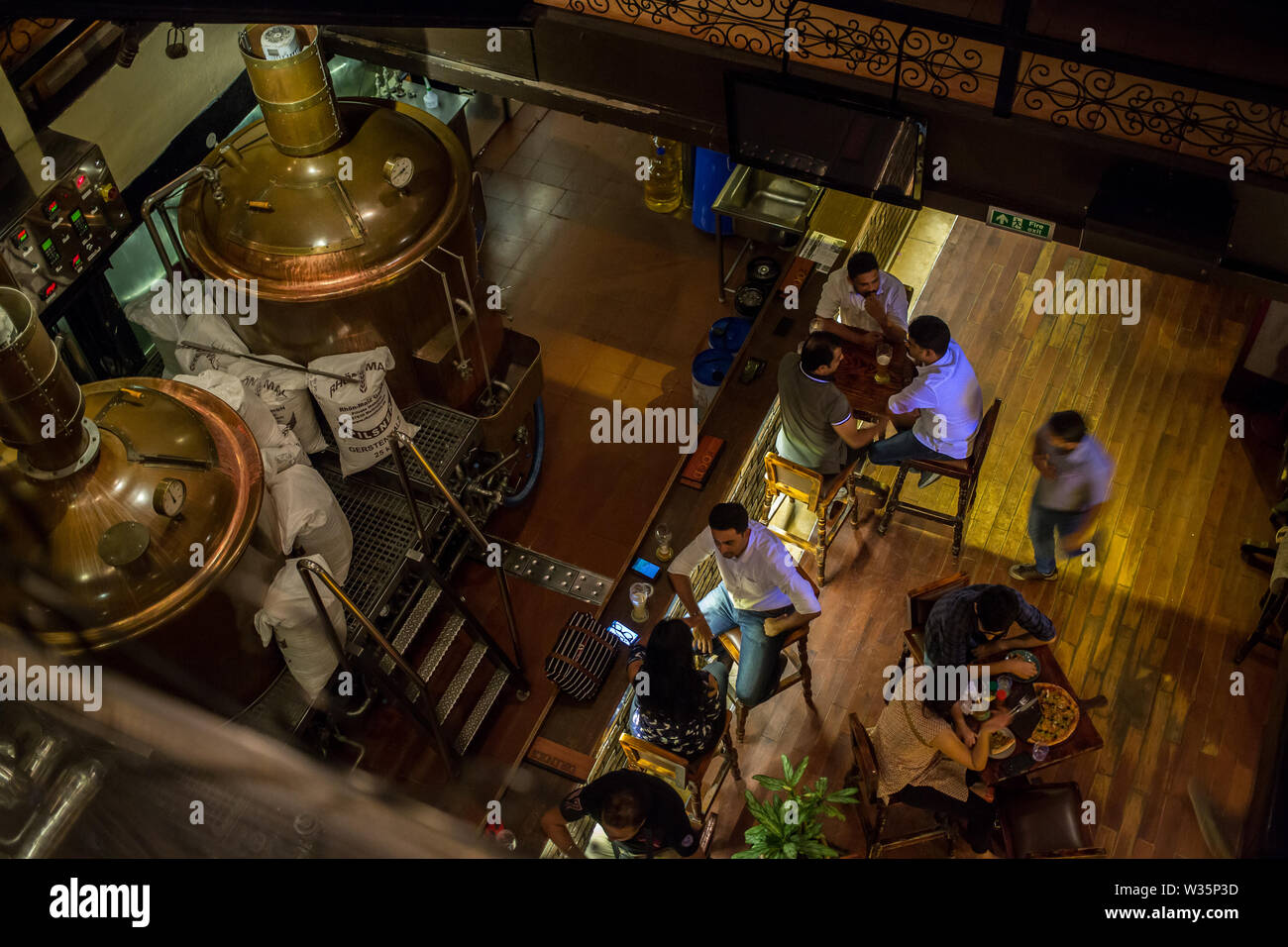 A top view of the ground floor with the beer tanks in Toits Brewpub in Bangalore, India. Stock Photo