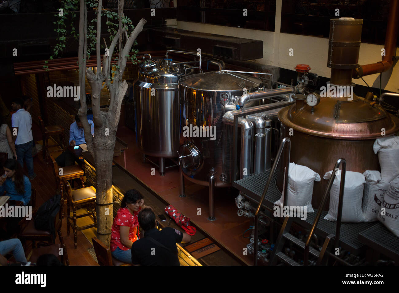 View of beer tanks in Toit Brewpub in Bangalore, India. Stock Photo