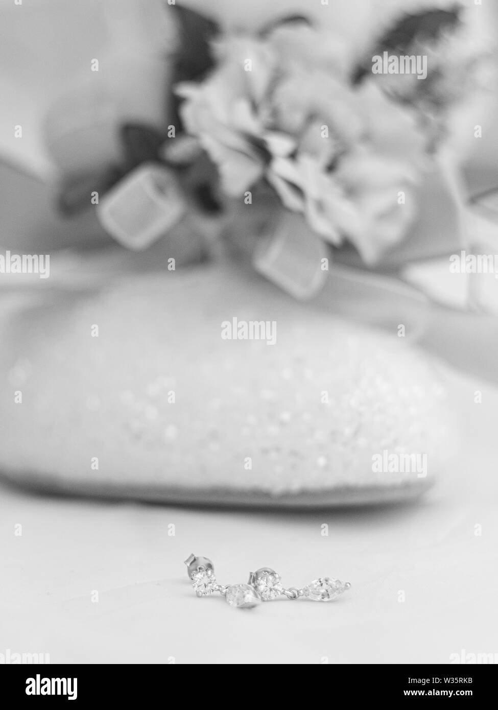 wedding dress, flowers shoes, earrings Stock Photo