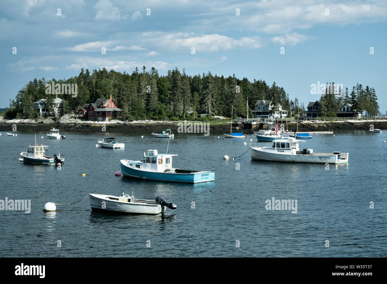 Commercial fishing boats moored in the harbor at Five Islands Harbor