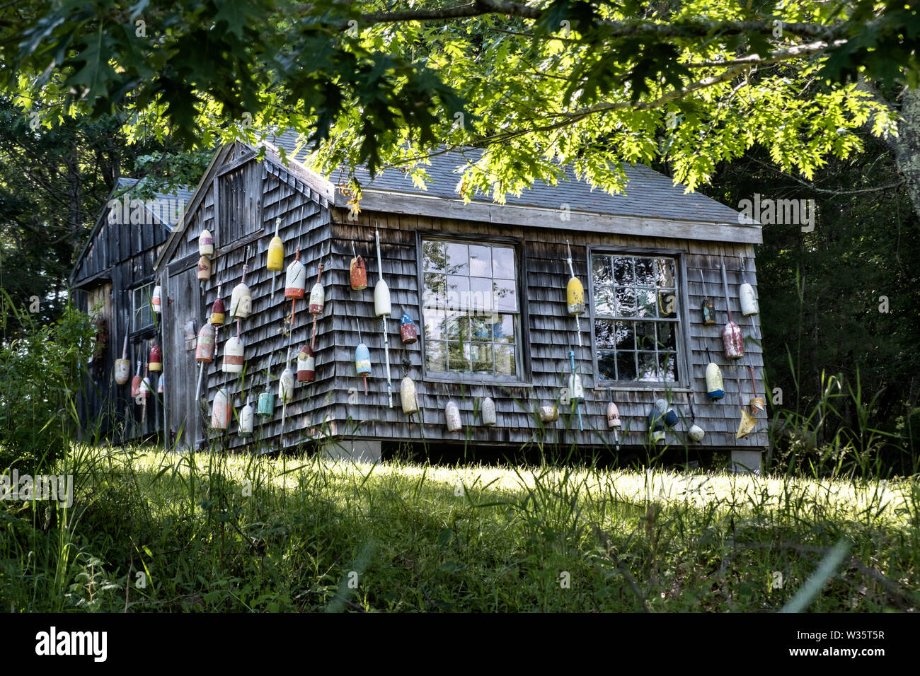 A traditional Maine cottage decorated with lobster buoys at Five