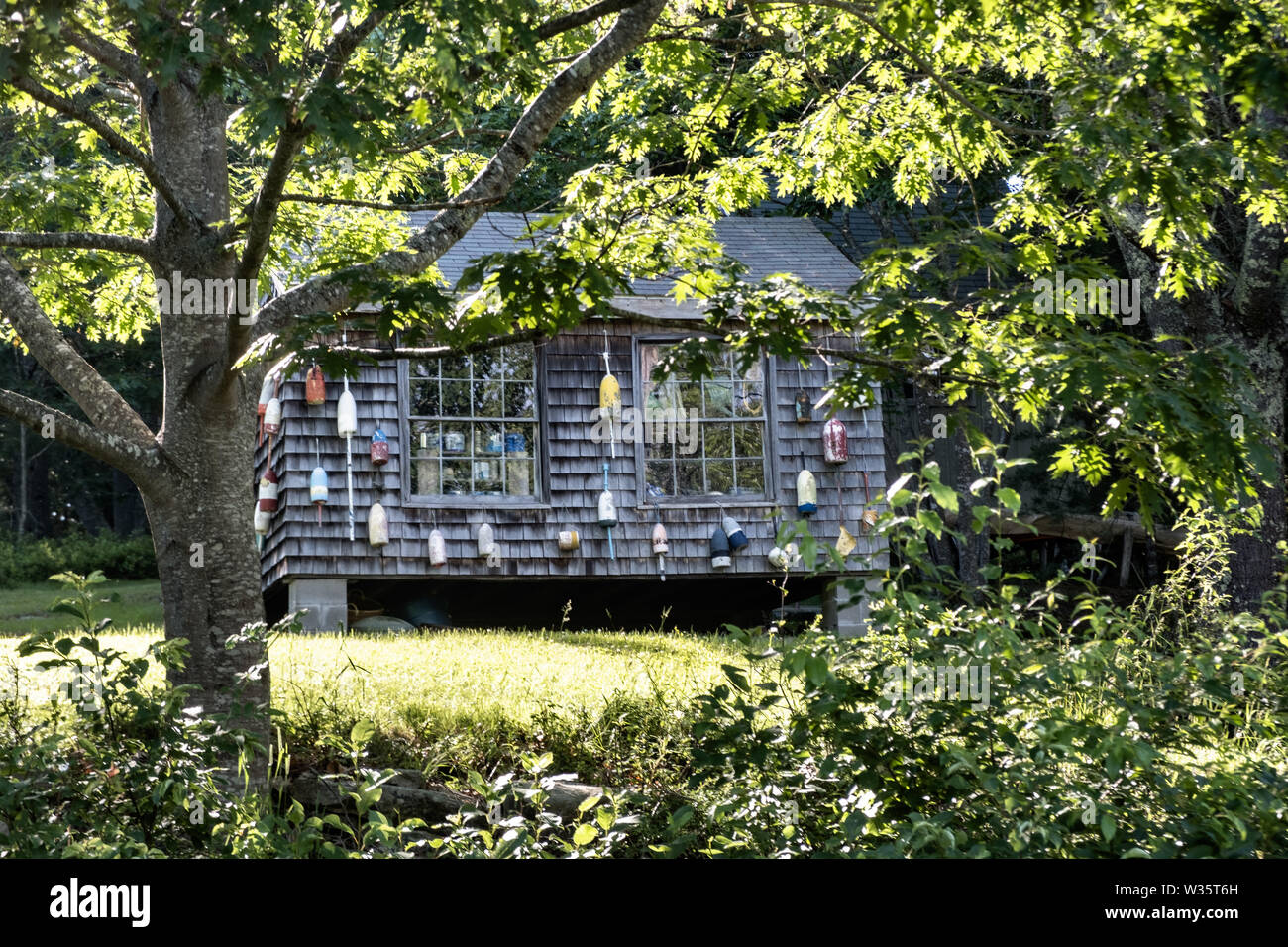 A traditional Maine cottage decorated with lobster buoys at Five