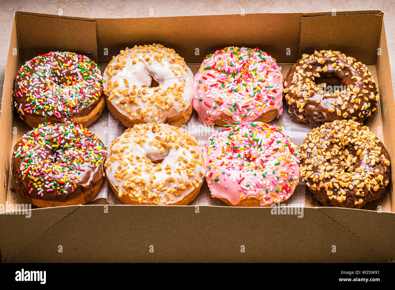 assorted donuts in paper box Stock Photo