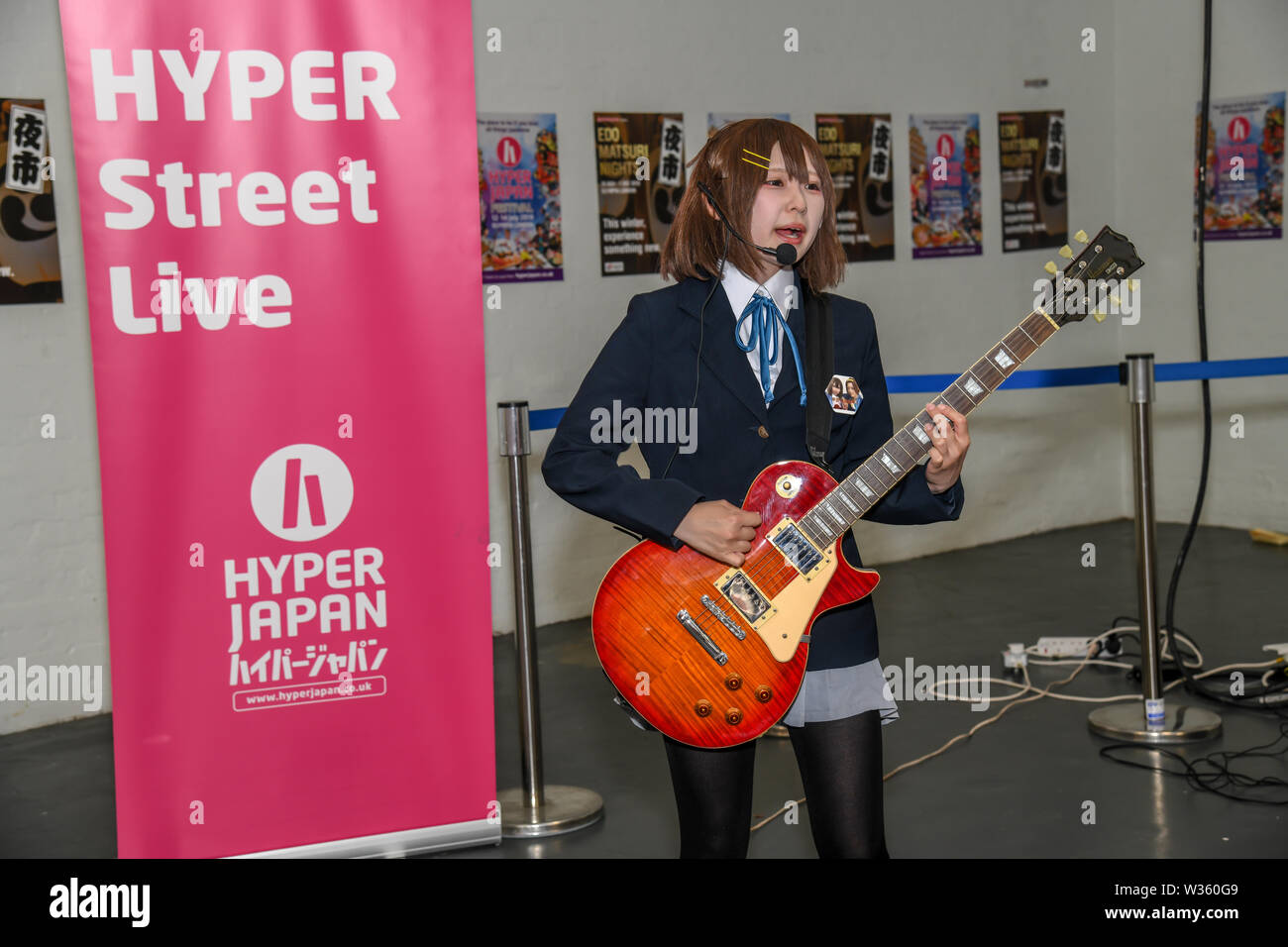 London, UK. 12th July, 2019. Petite Japanese girls a street musician performs at Hyper Japan Festival 2019, on 12 July 2019, Olympia London, UK. Credit: Picture Capital/Alamy Live News Stock Photo