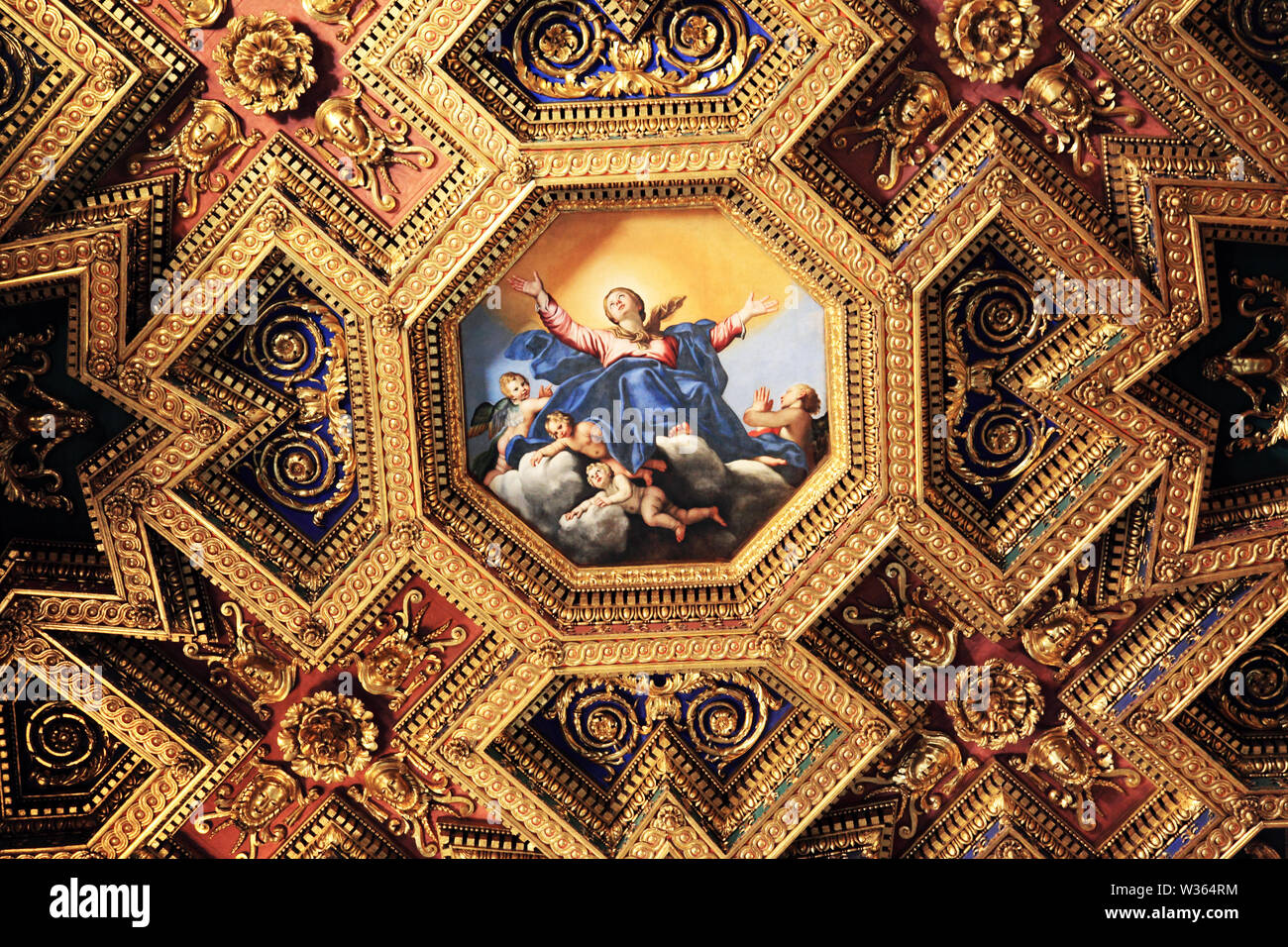 The ornate wooden ceiling of the Basilica di Santa Maria in Trastevere Rome Stock Photo