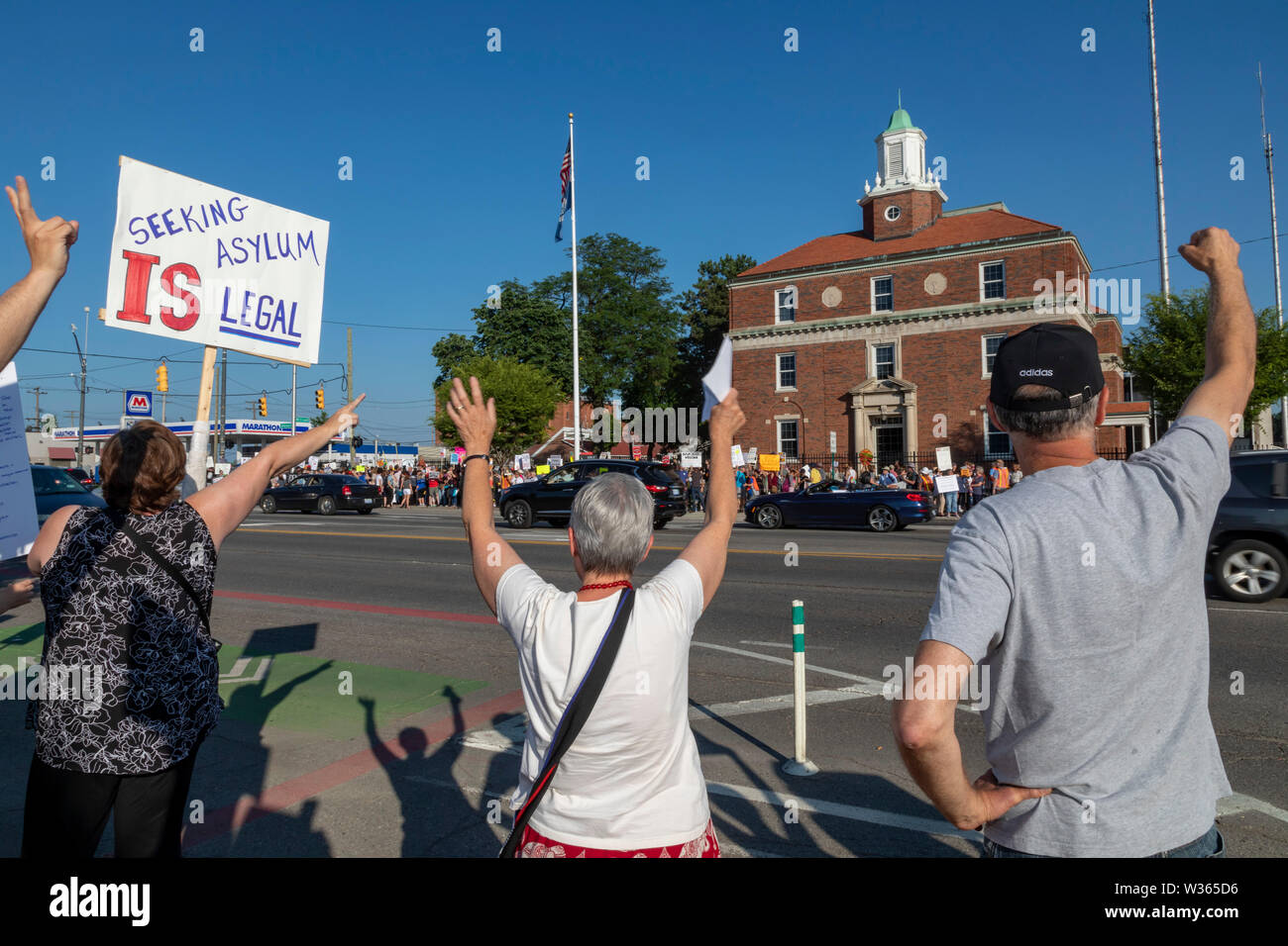 Detroit, Michigan USA - 12 July 2019 - People upset about the separation of immigrant families and the detention of refugees and small children lined Stock Photo