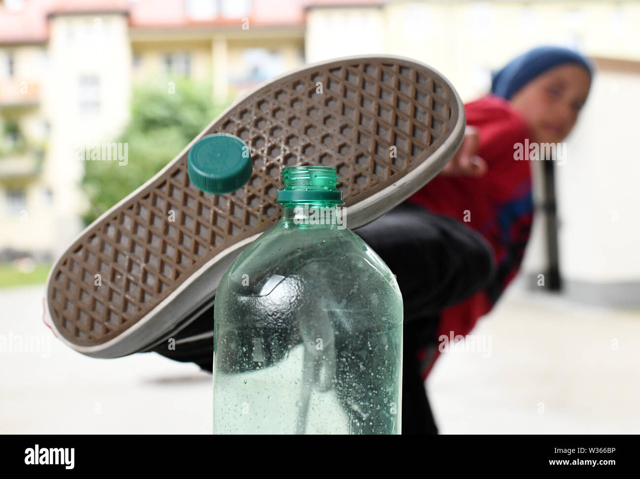 Kicking a plastic bottle hi-res stock photography and images - Alamy