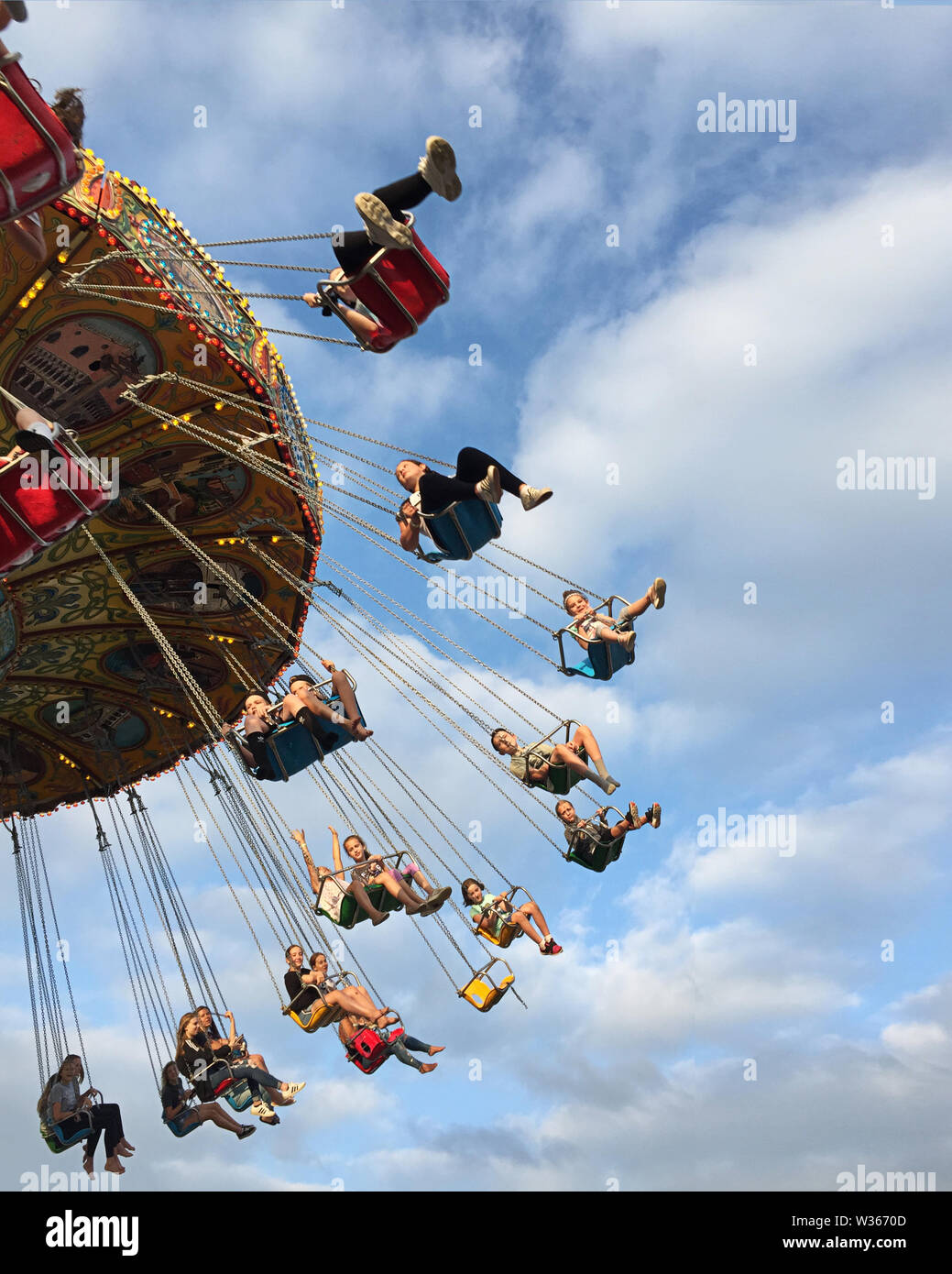 Amusement park ride swings Stock Photo