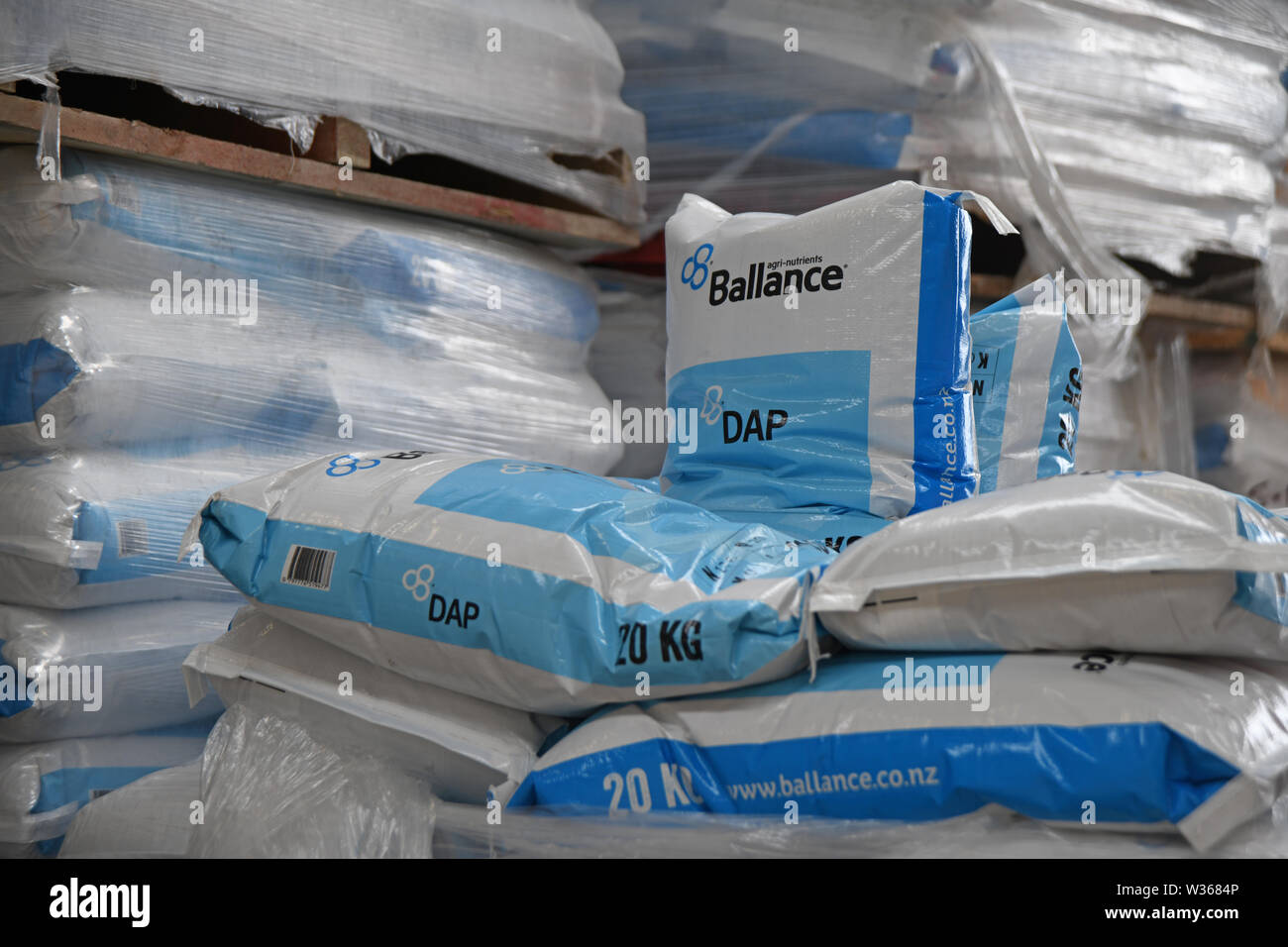 CHRISTCHURCH, NEW ZEALAND, DECEMBER 12, 2018: Several 20 kg bags of fertiliser await shipment at a factory. Stock Photo