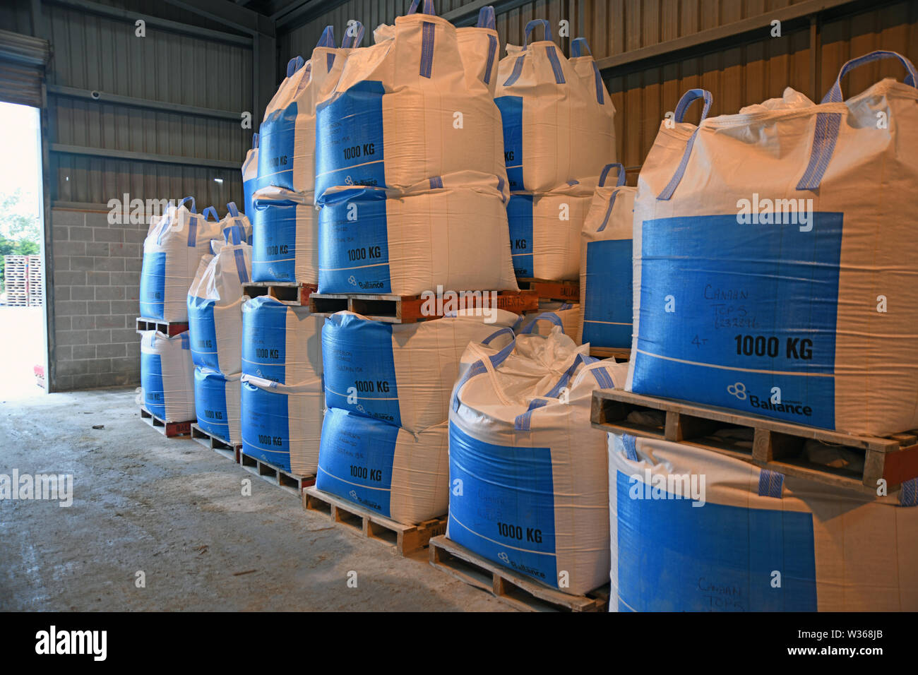 CHRISTCHURCH, NEW ZEALAND, DECEMBER 12, 2018: Several cubic metre bags of bulk fertiliser await shipment at a factory. Stock Photo