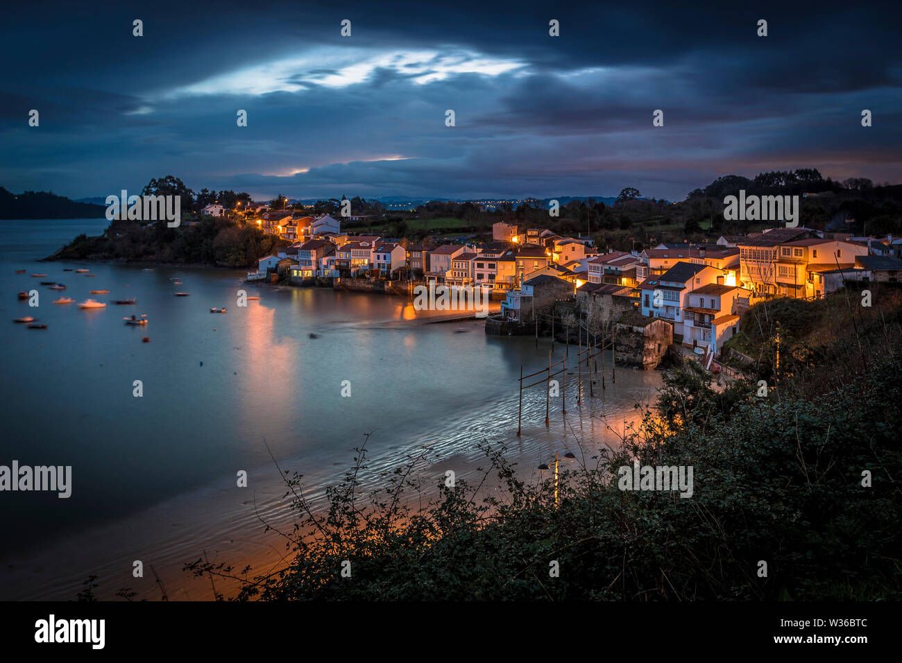 Coastal fishing town of Redes in Ares estuary, Galicia Spain Stock Photo
